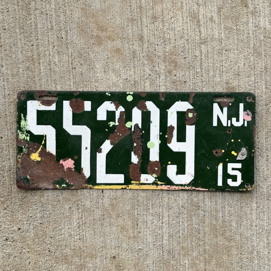 Photo of a 1915 New Jersey Porcelain License Plate Auto Tag Garage Decor Vintage 55209 with original patina