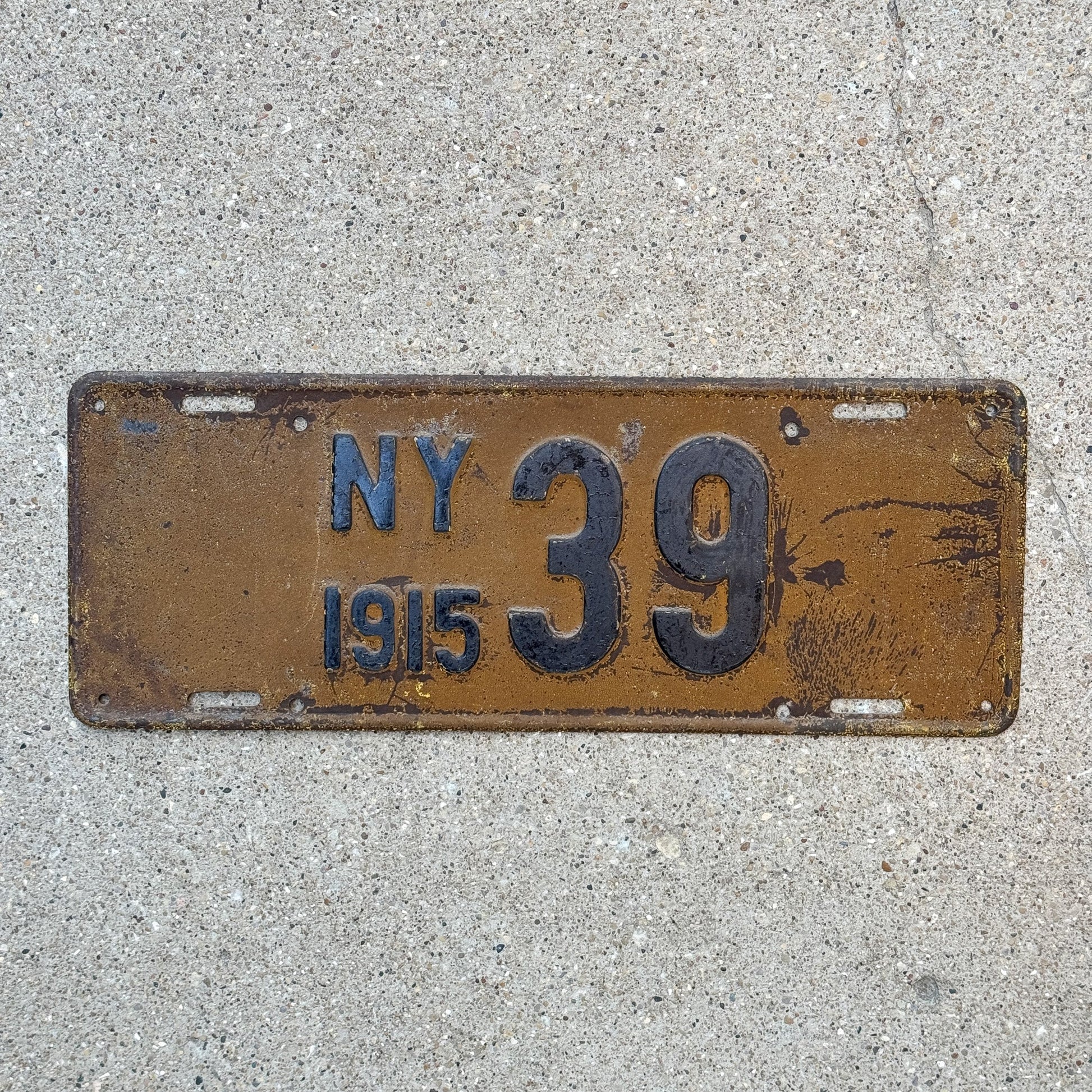 Photo of a 1915 New York Reserved Passenger License Plate Auto Tag Garage Decor Vintage Low Number Two Digit 39 with original patina