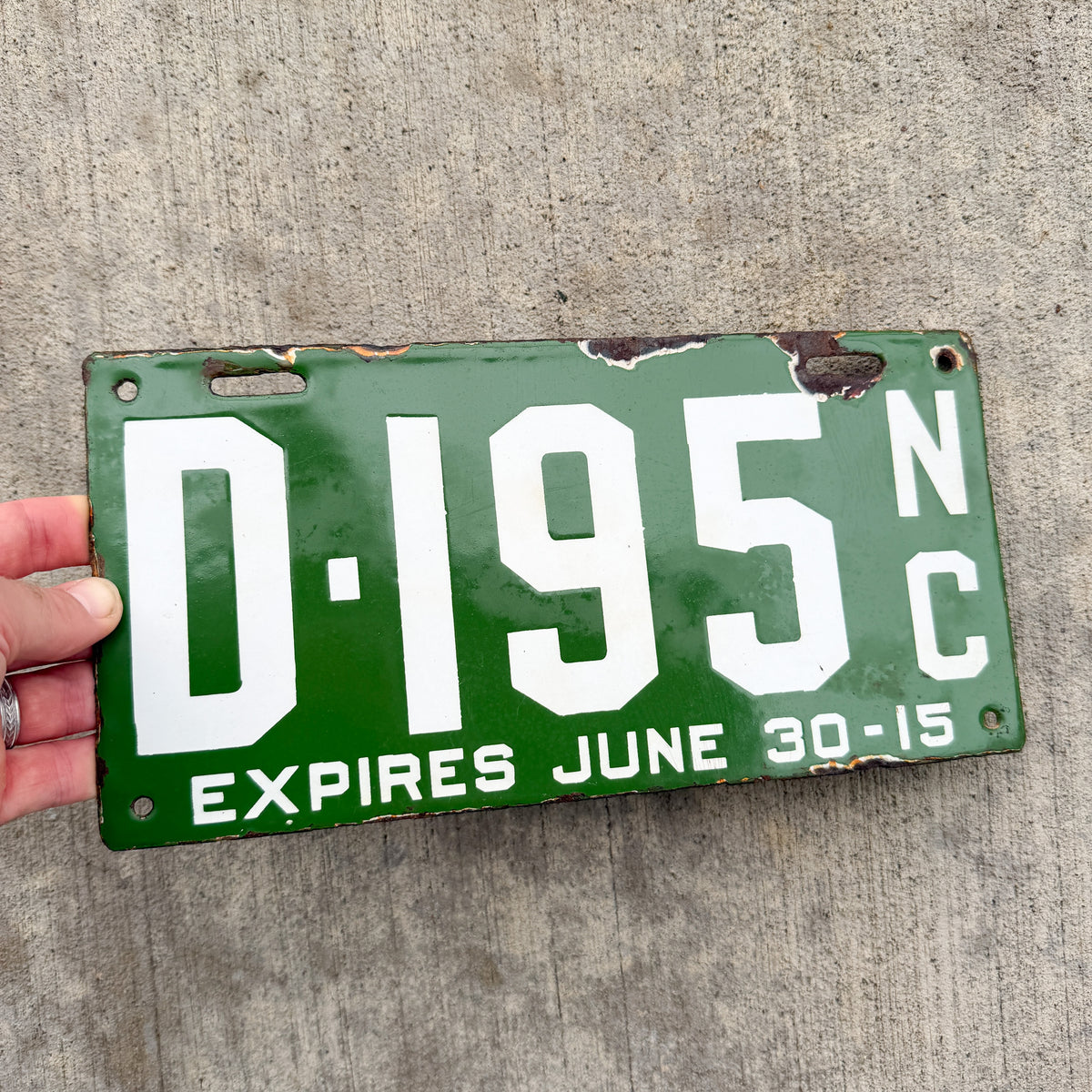 Photo of a 1915 North Carolina Porcelain Dealer License Plate Auto Tag Garage Decor Vintage 195 with original patina