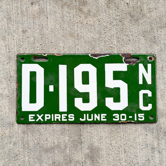 Photo of a 1915 North Carolina Porcelain Dealer License Plate Auto Tag Garage Decor Vintage 195 with original patina
