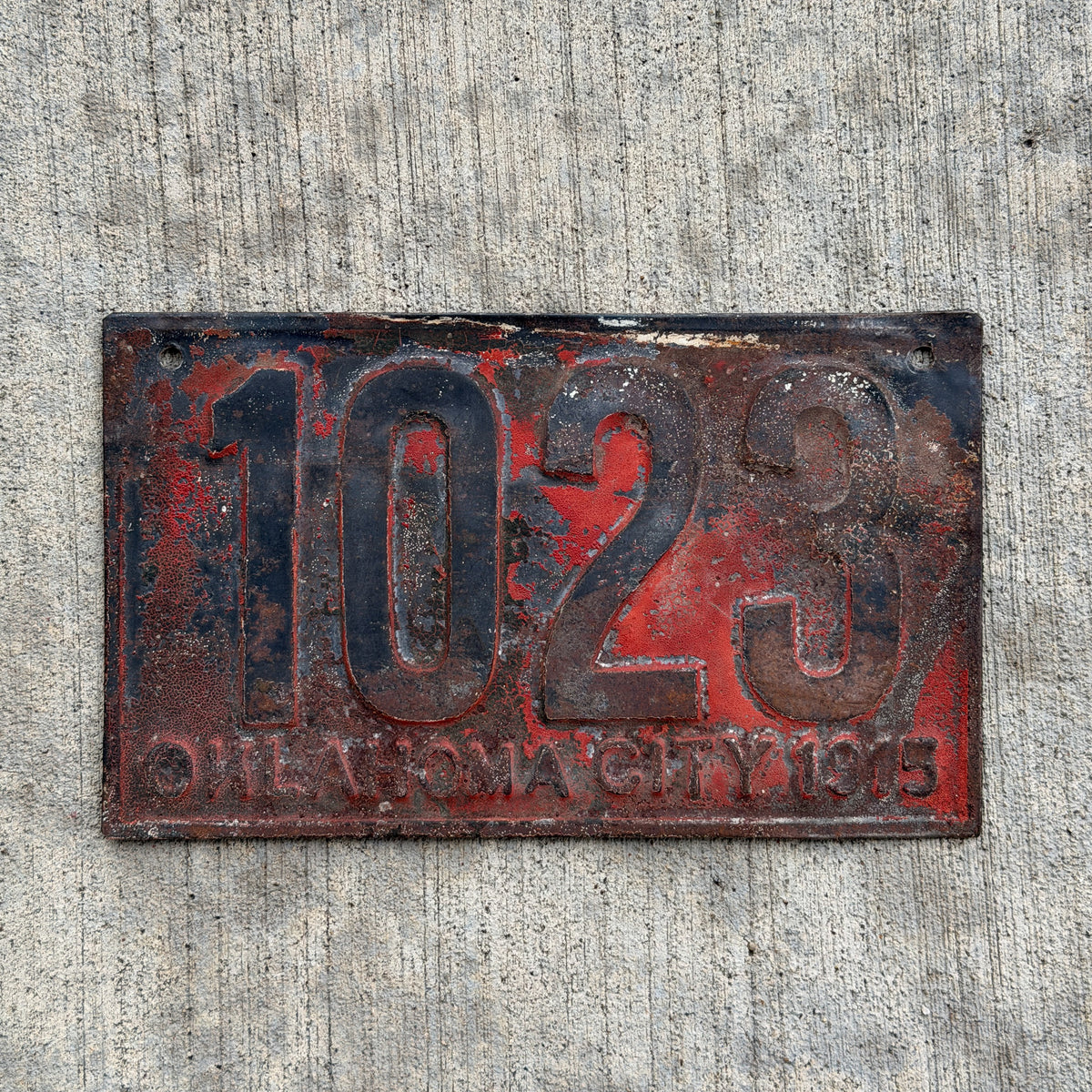 Photo of a 1915 Oklahoma Prestate License Plate Auto Tag Garage Decor Vintage Oklahoma City 1023 with original patina