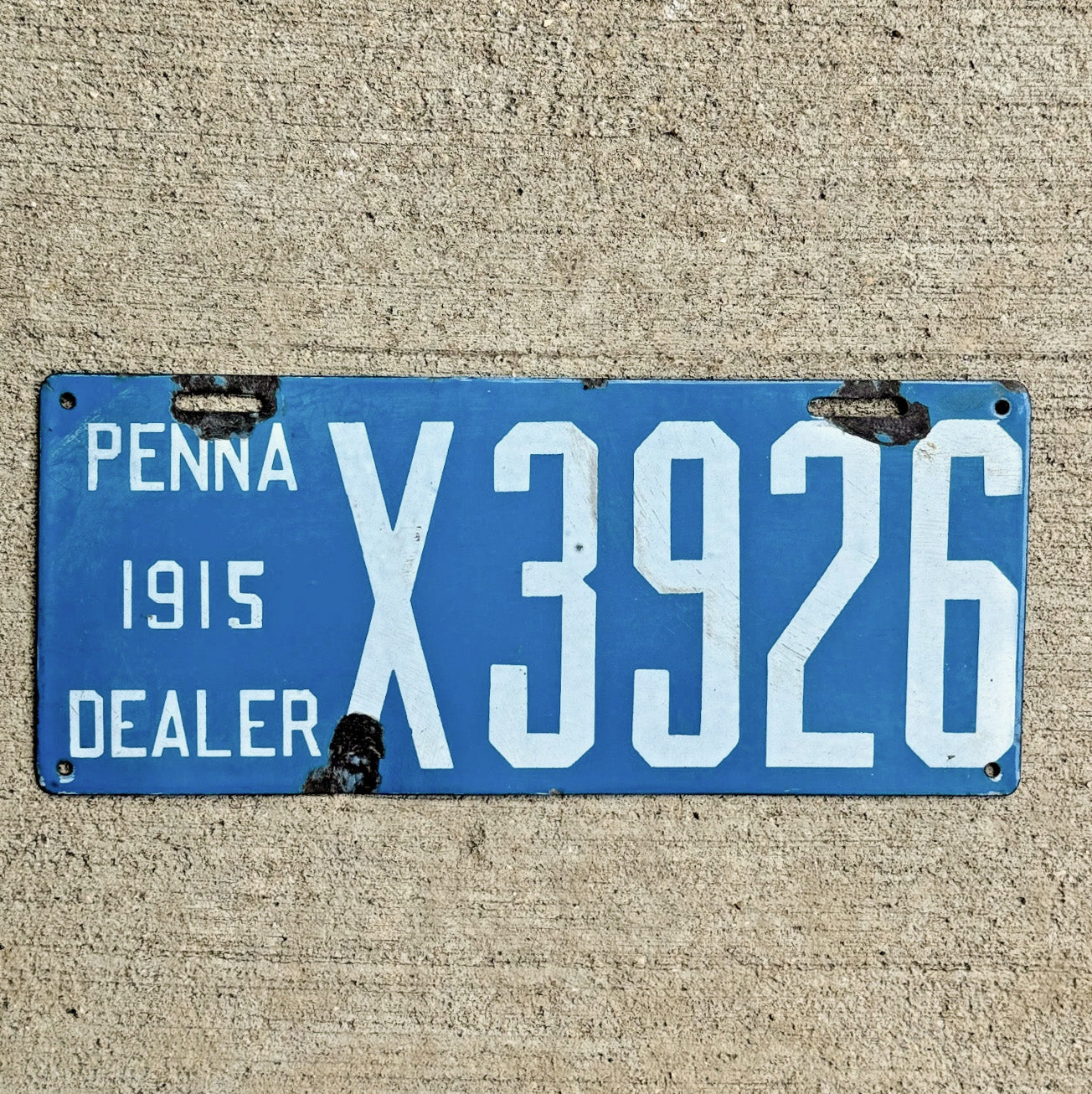 Photo of a 1915 Pennsylvania Porcelain Dealer Auto Tag Garage Decor Vintage X 3926 with original patina
