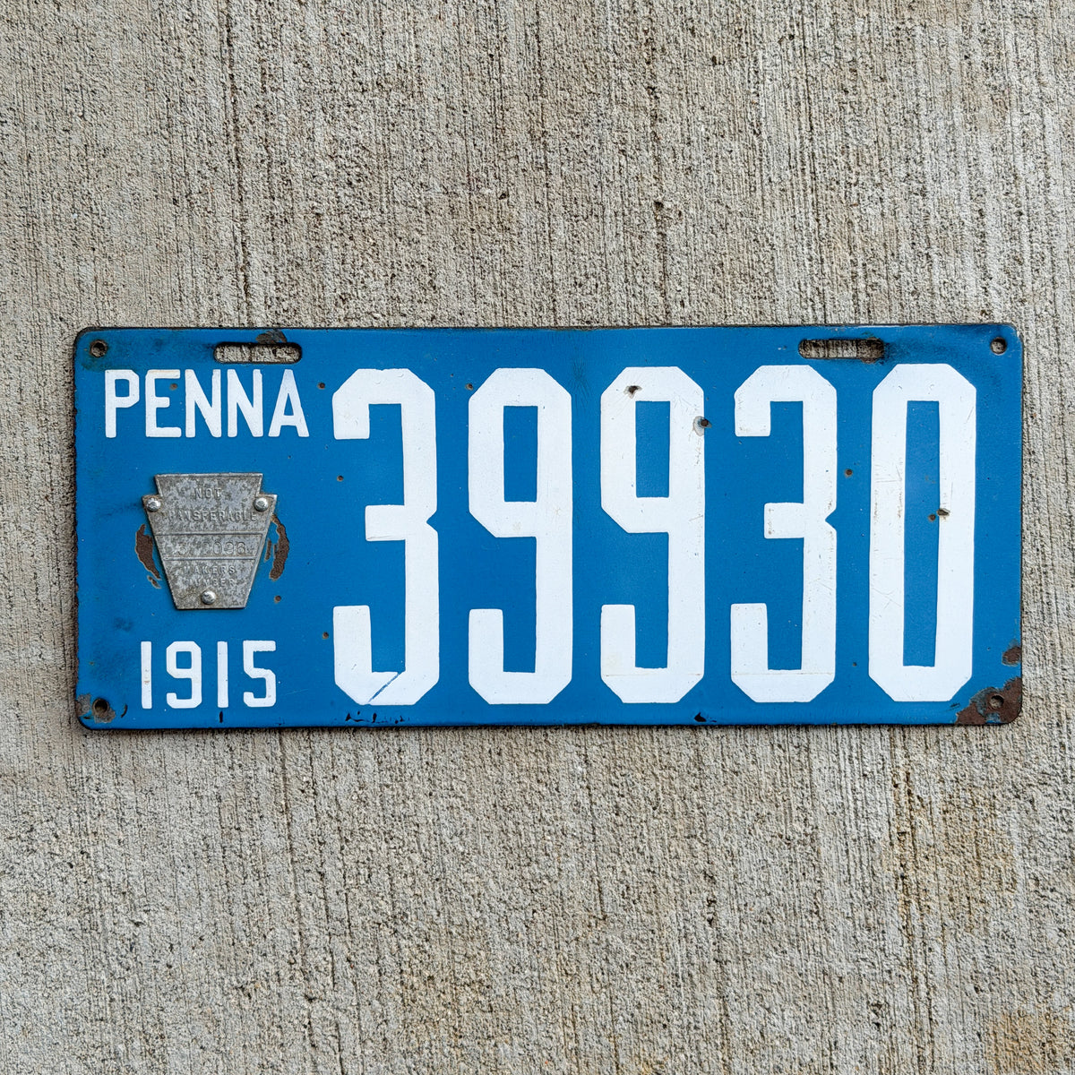 Photo of a 1915 Pennsylvania Porcelain License Plate Auto Tag 1 Vintage 39930 with original patina