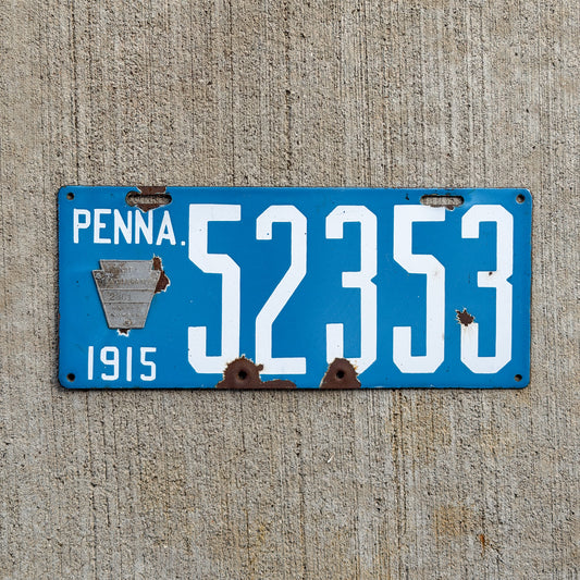 Photo of a 1915 Pennsylvania Porcelain License Plate Auto Tag 1 Vintage Blue Back Type 52353 with original patina