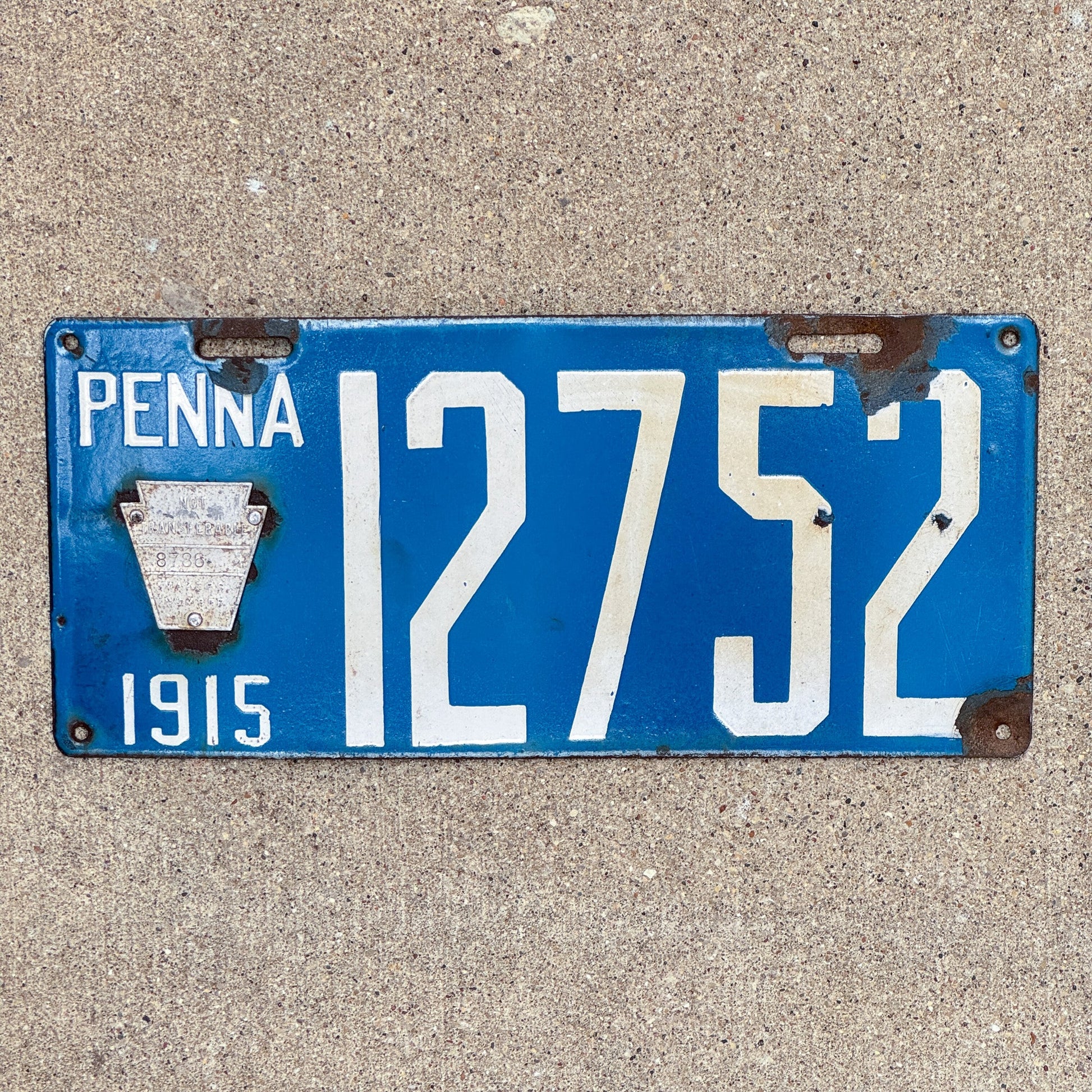 Photo of a 1915 Pennsylvania Porcelain License Plate Auto Tag Garage Decor Vintage 12752 with original patina