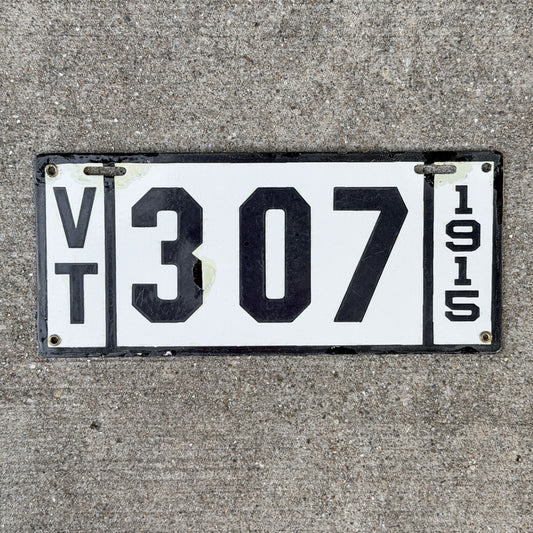 Photo of a 1915 Vermont Porcelain License Plate Auto Tag Garage Decor Vintage Low Number Three Digit 307 with original patina