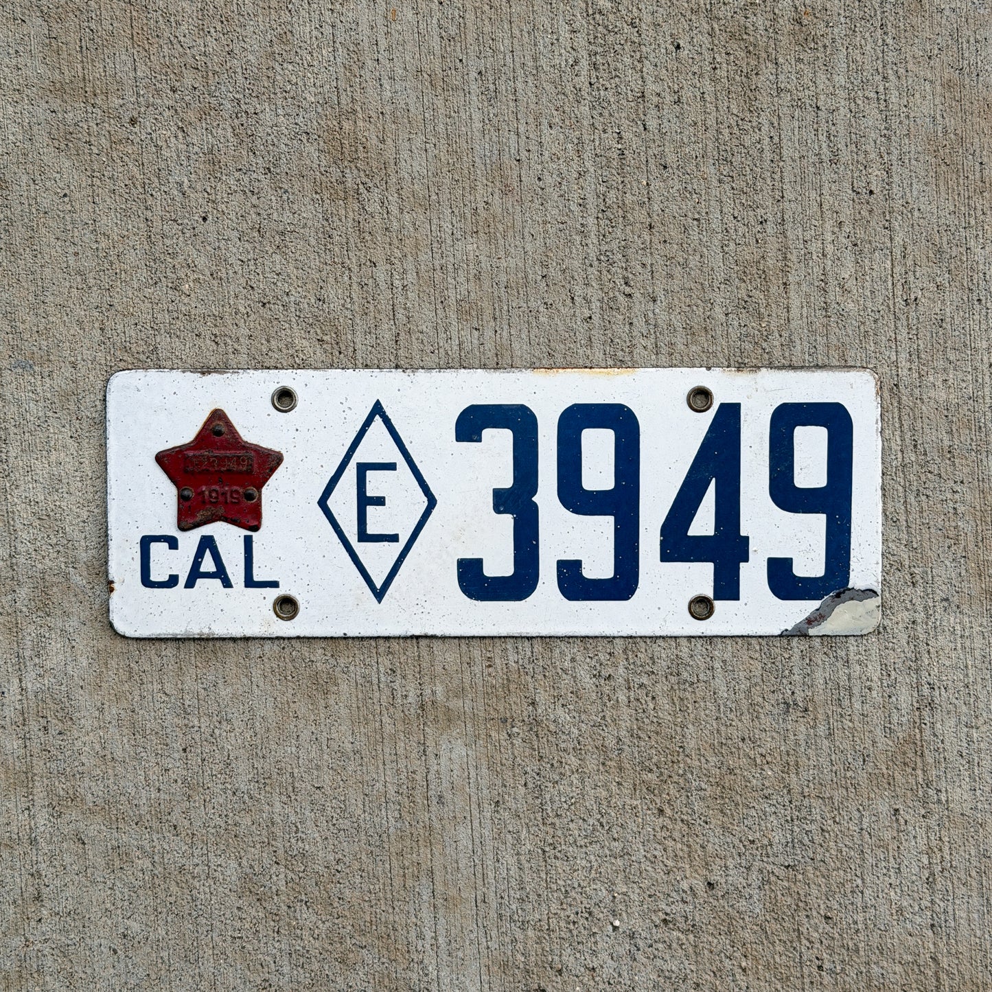 Photo of a 1916 1919 California Porcelain Exempt License Plate Auto Tag Garage Decor Vintage 3949 with original patina