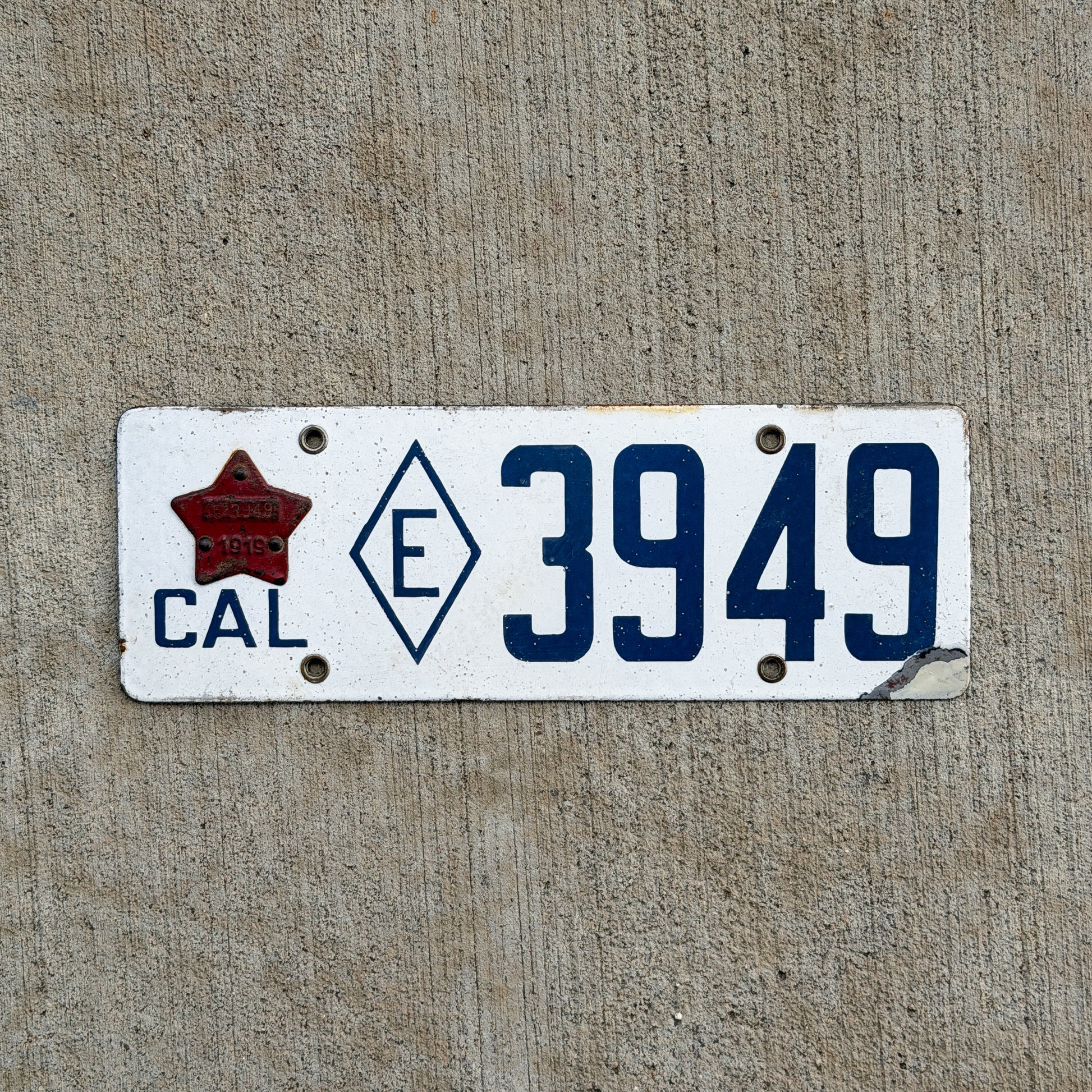 Photo of a 1916 1919 California Porcelain Exempt License Plate Auto Tag Garage Decor Vintage 3949 with original patina