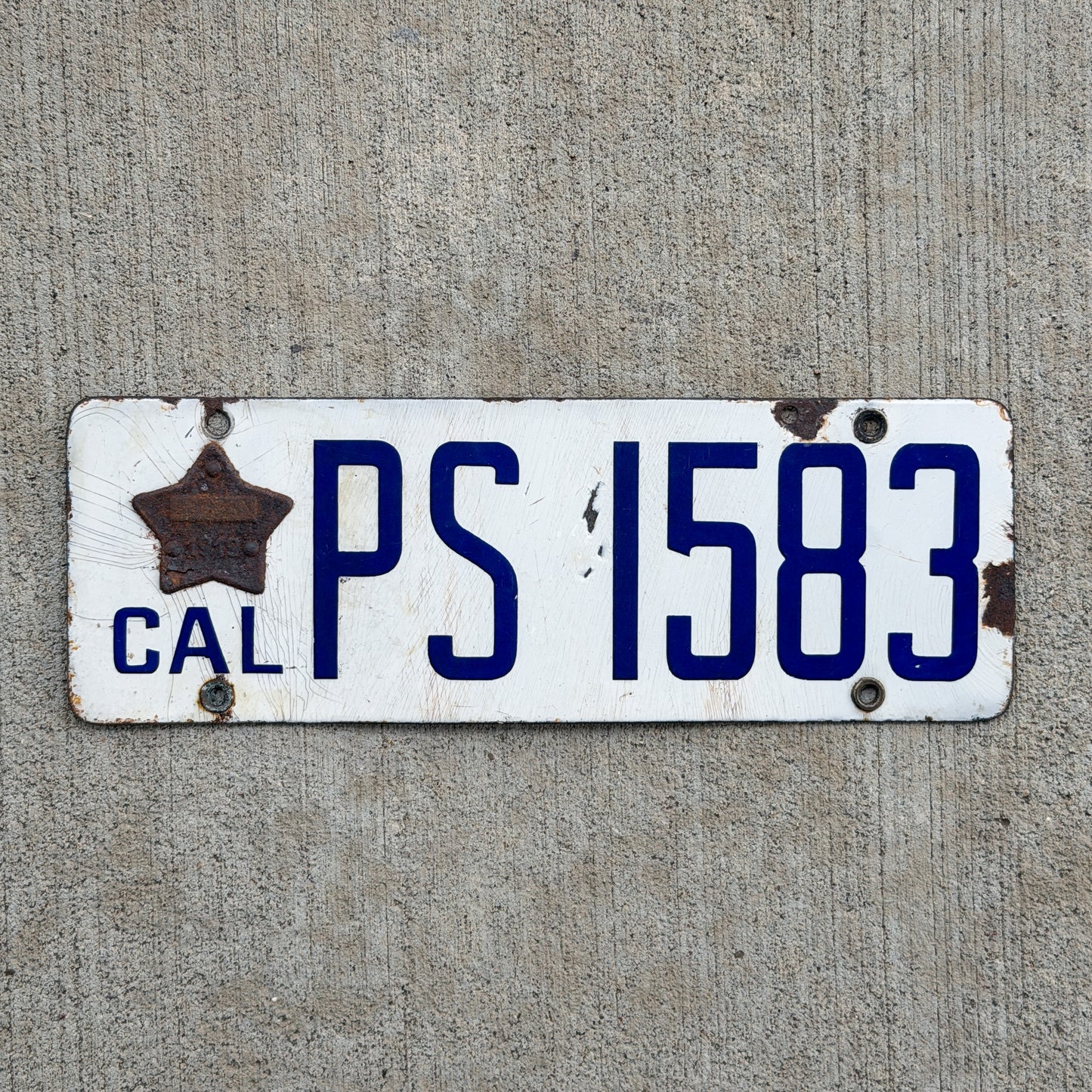 Photo of a 1916 1919 California Porcelain Public Service License Plate Auto Tag Garage Decor Vintage PS 1583 with original patina