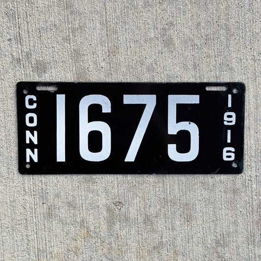Photo of a 1916 Connecticut Porcelain License Plate Auto Tag 1 Vintage Garage Low Number Four Digit High Quality 1675 with original patina
