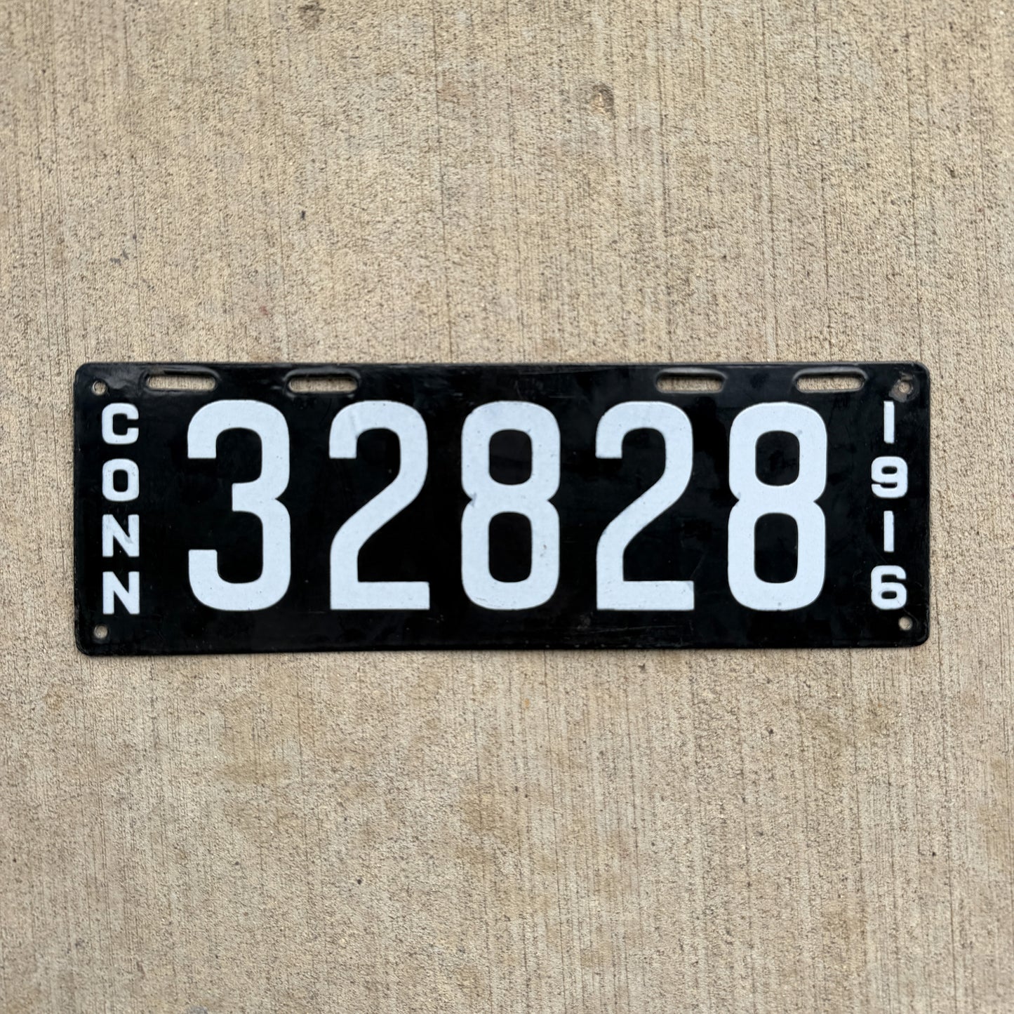 Photo of a 1916 Connecticut Porcelain License Plate Auto Tag Garage Decor Vintage 32828 with original patina