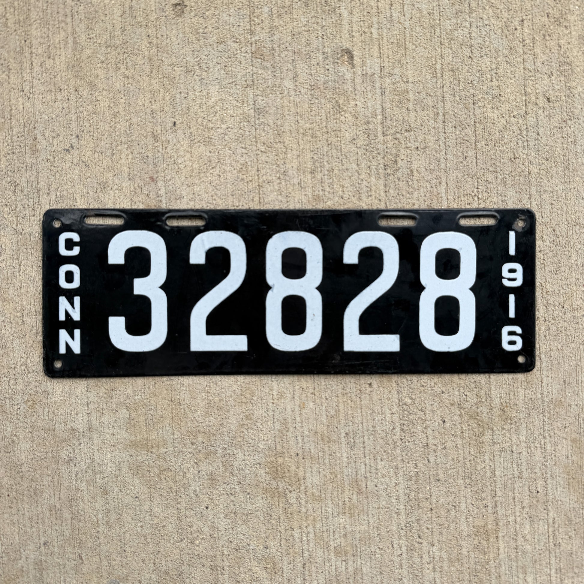 Photo of a 1916 Connecticut Porcelain License Plate Auto Tag Garage Decor Vintage 32828 with original patina