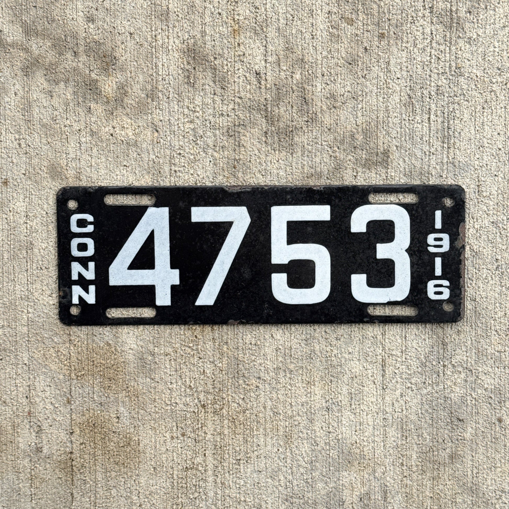 Photo of a 1916 Connecticut Porcelain Motorcycle License Plate Auto Tag Garage Decor Vintage 4753 with original patina