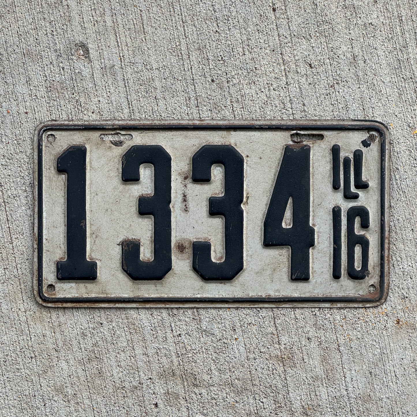 Photo of a 1916 Illinois License Plate Auto Tag Garage Decor Vintage Low Number Four Digit 1334 with original patina