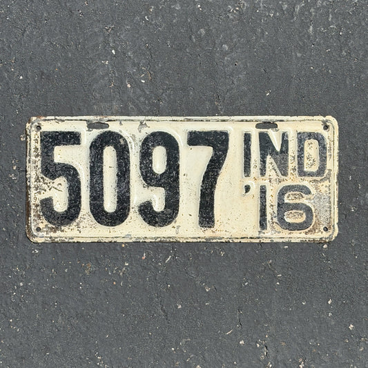 Photo of a 1916 Indiana License Plate Auto Tag Garage Decor Vintage Low Number Four Digit 5097 with original patina
