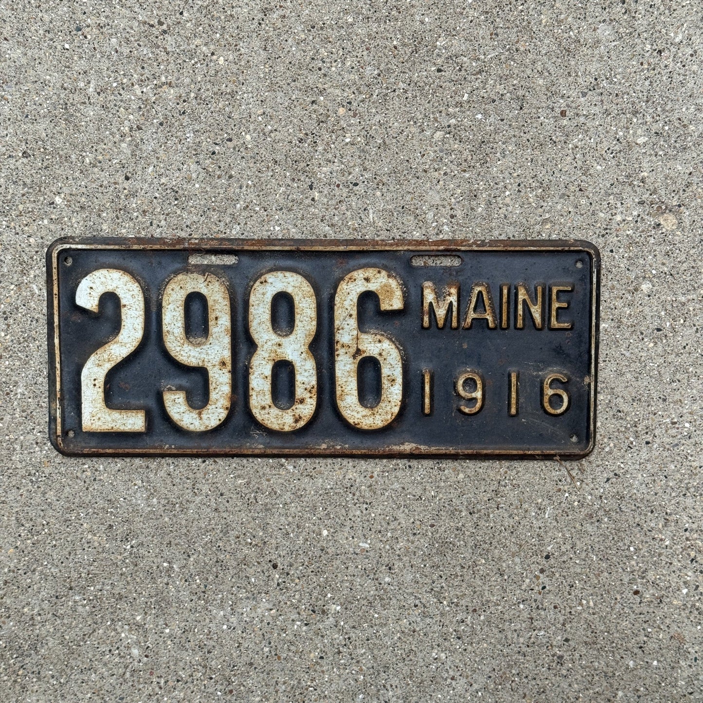 Photo of a 1916 Maine License Plate Auto Tag Garage Decor Vintage Low Number Four Digit 2986 with original patina