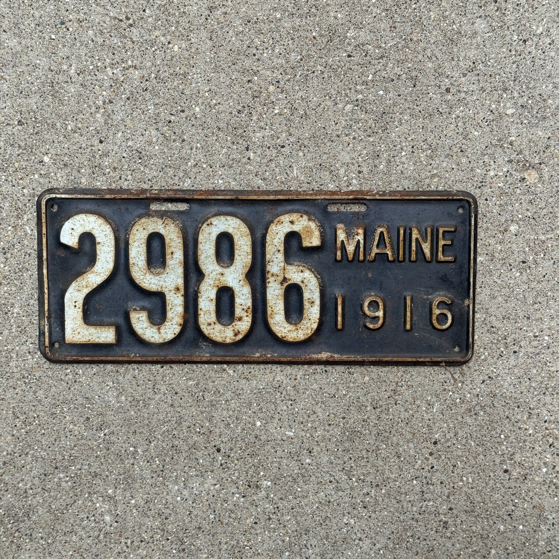 Photo of a 1916 Maine License Plate Auto Tag Garage Decor Vintage Low Number Four Digit 2986 with original patina