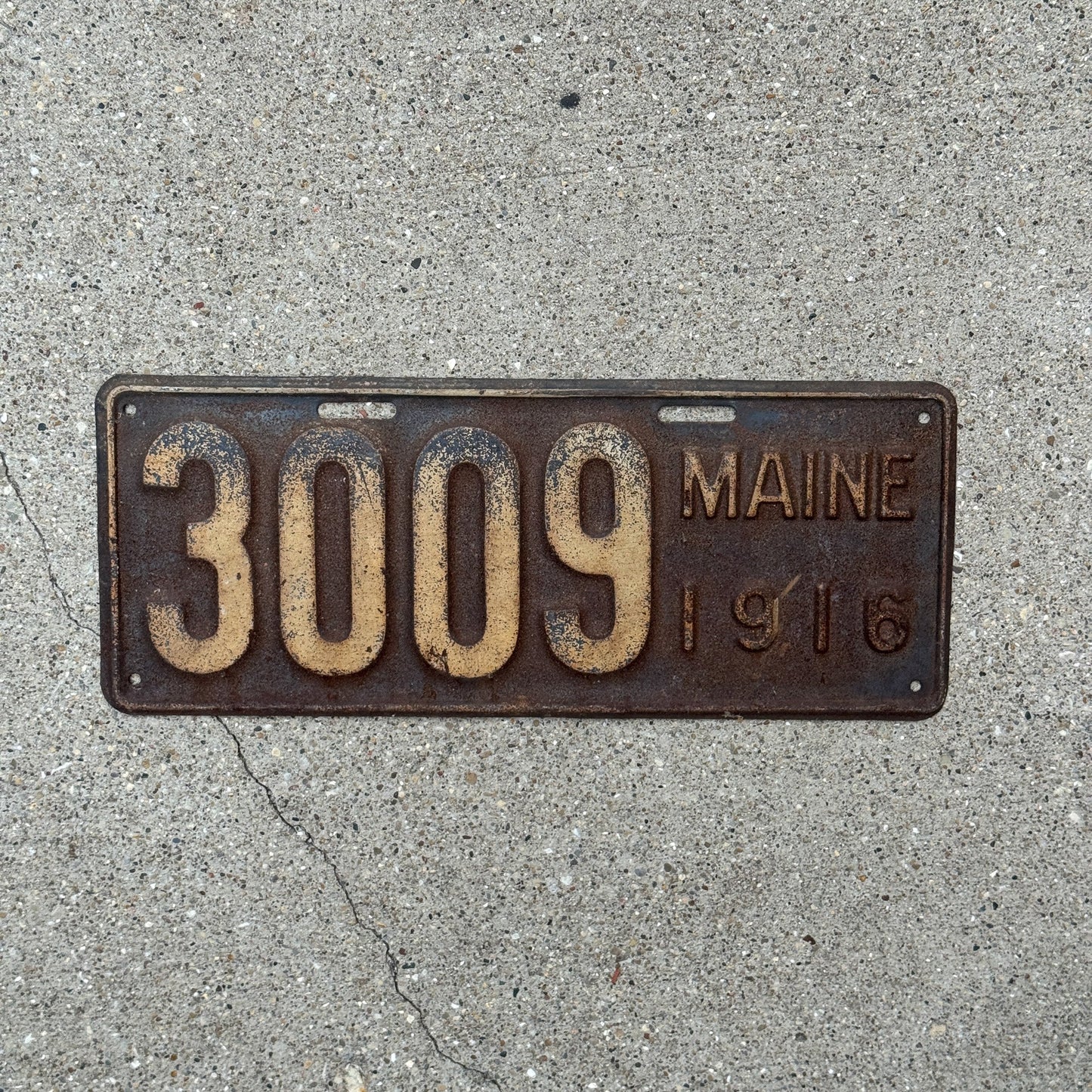 Photo of a 1916 Maine License Plate Auto Tag Garage Decor Vintage Low Number Four Digit 3009 with original patina