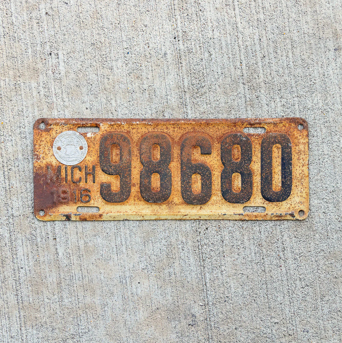 Photo of a 1916 Michigan License Plate Auto Tag Garage Decor Vintage 98680 with original patina