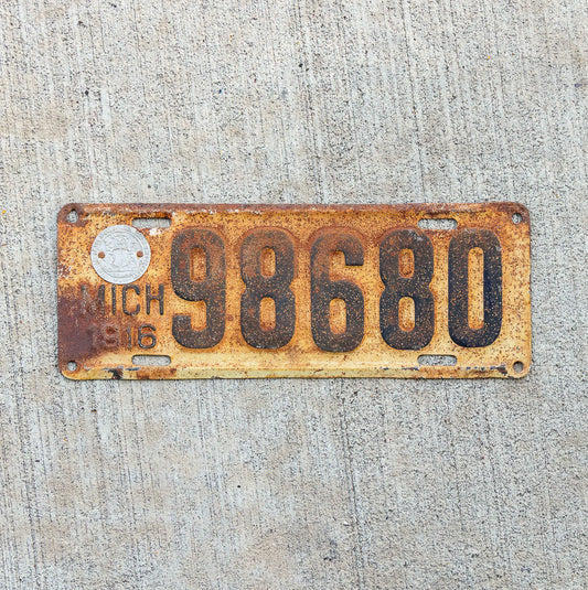 Photo of a 1916 Michigan License Plate Auto Tag Garage Decor Vintage 98680 with original patina