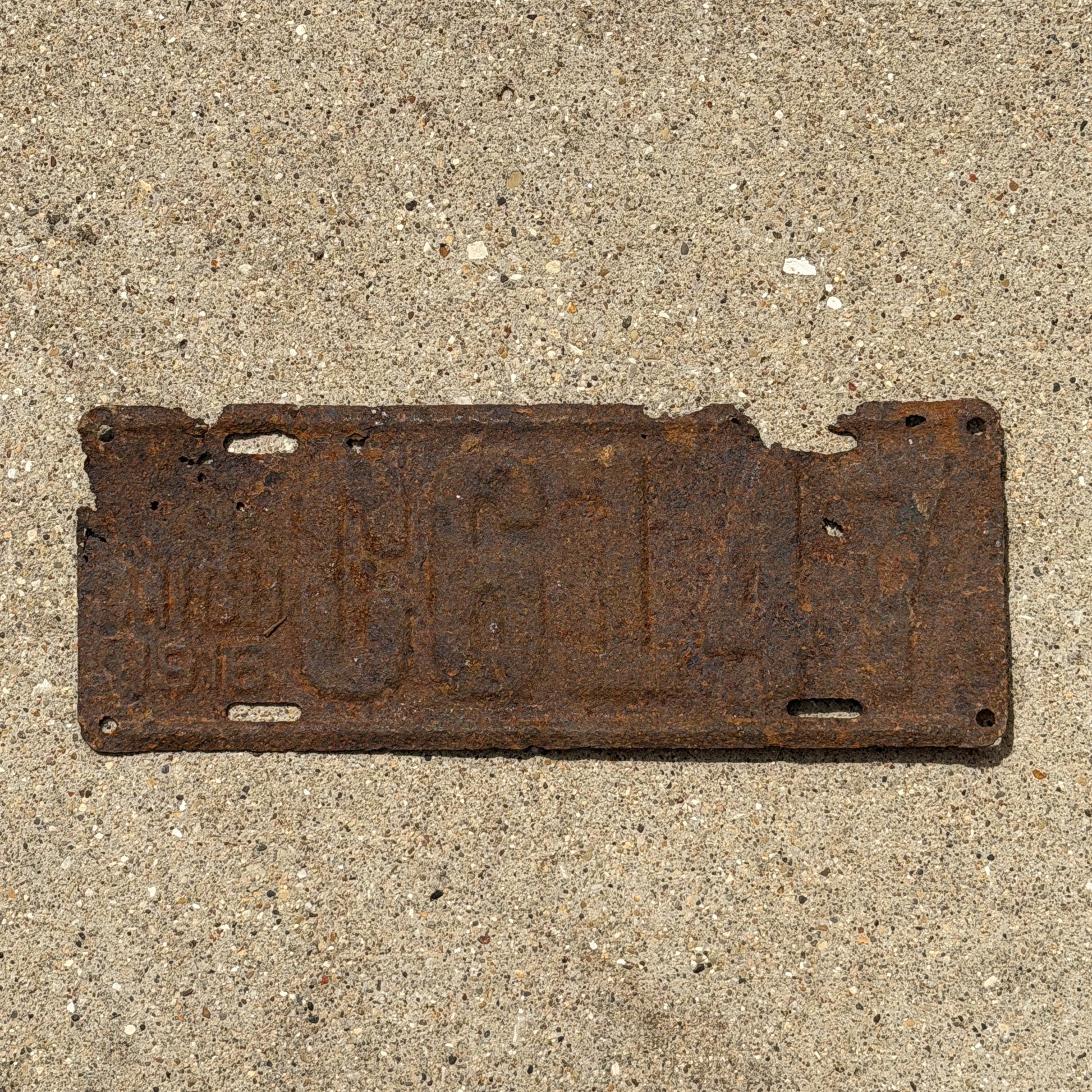 Photo of a 1916 Michigan License Plate Auto Tag Garage Decor Vintage C 6147 with original patina