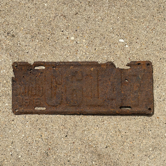 Photo of a 1916 Michigan License Plate Auto Tag Garage Decor Vintage C 6147 with original patina