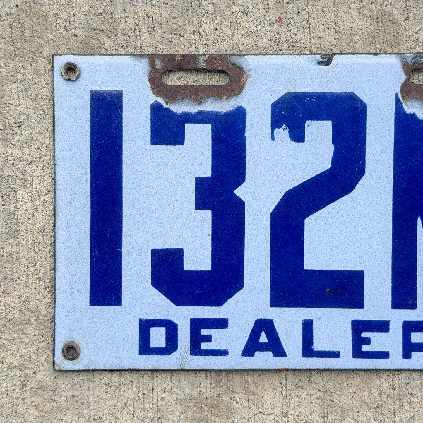 Photo of a 1916 New Brunswick Porcelain Dealer License Plate Auto Tag Garage Decor Vintage High Quality 132 with original patina