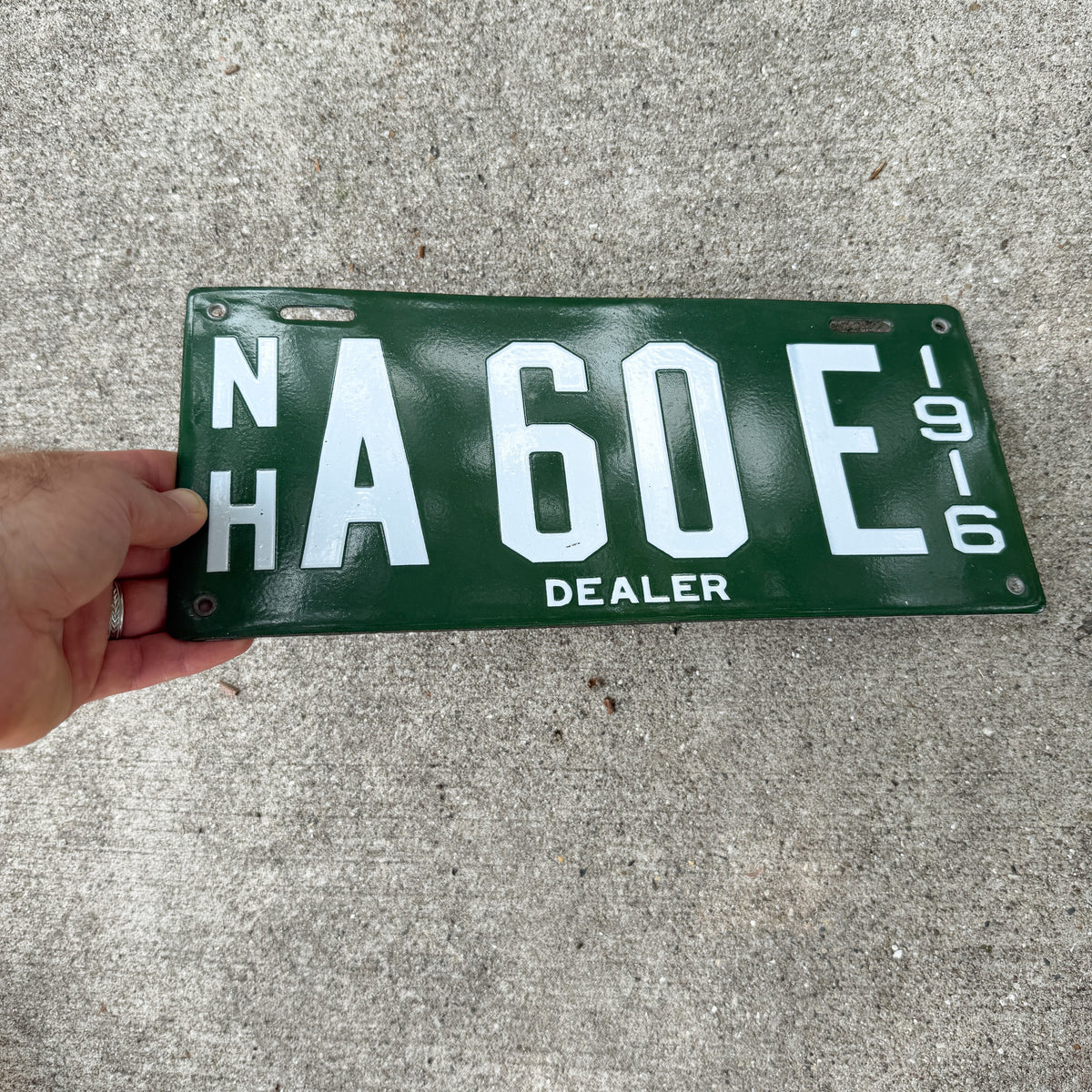 Photo of a 1916 New Hampshire Porcelain Dealer License Plate Auto Tag Garage Decor Vintage High Quality A 60 E with original patina