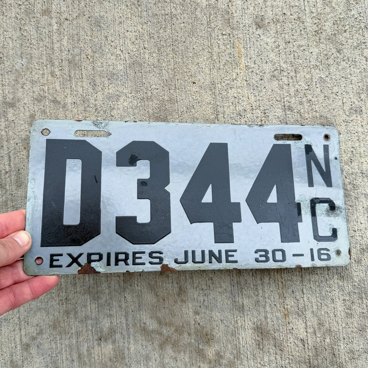 Photo of a 1916 North Carolina Porcelain Dealer License Plate Auto Tag Garage Decor Vintage 344 with original patina