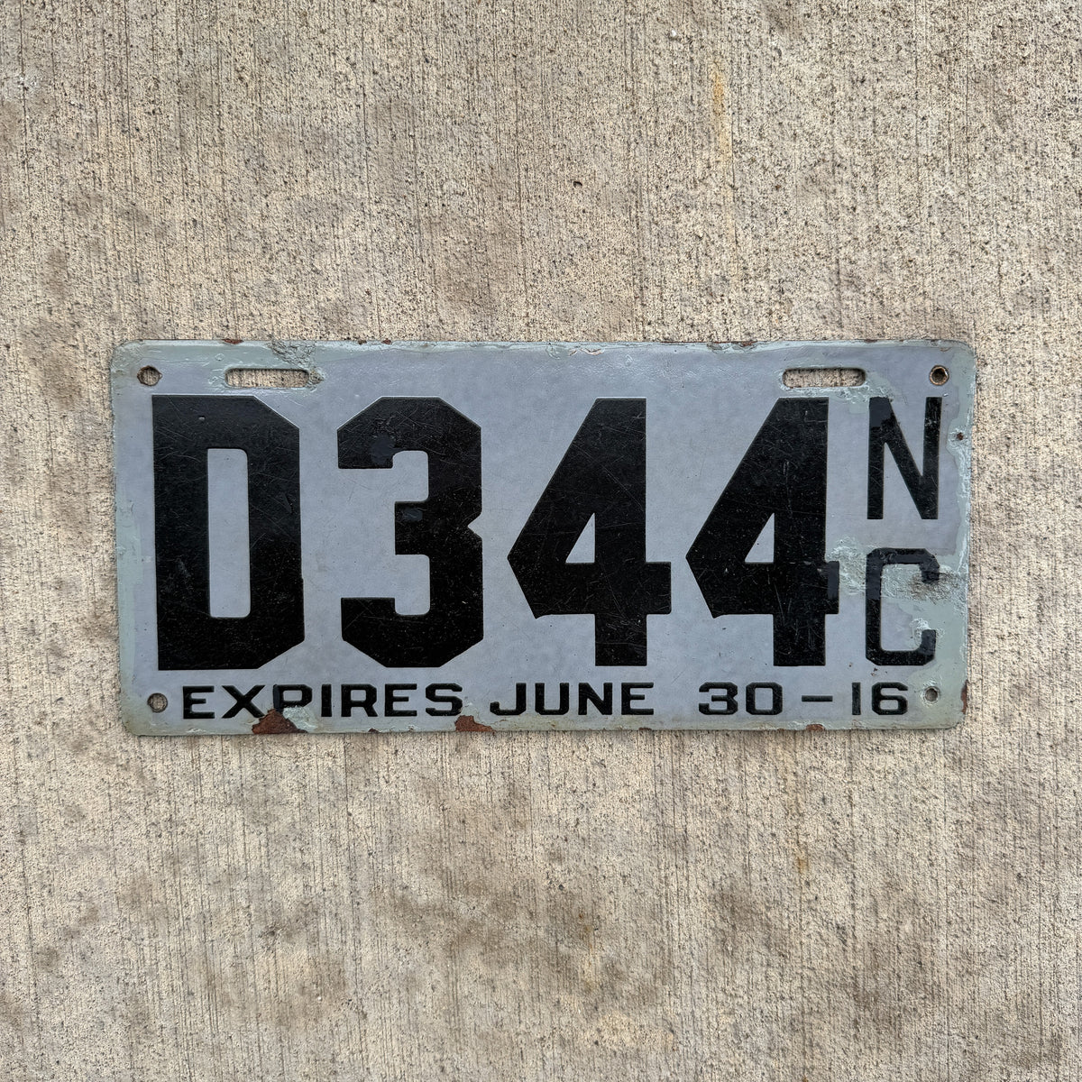 Photo of a 1916 North Carolina Porcelain Dealer License Plate Auto Tag Garage Decor Vintage 344 with original patina