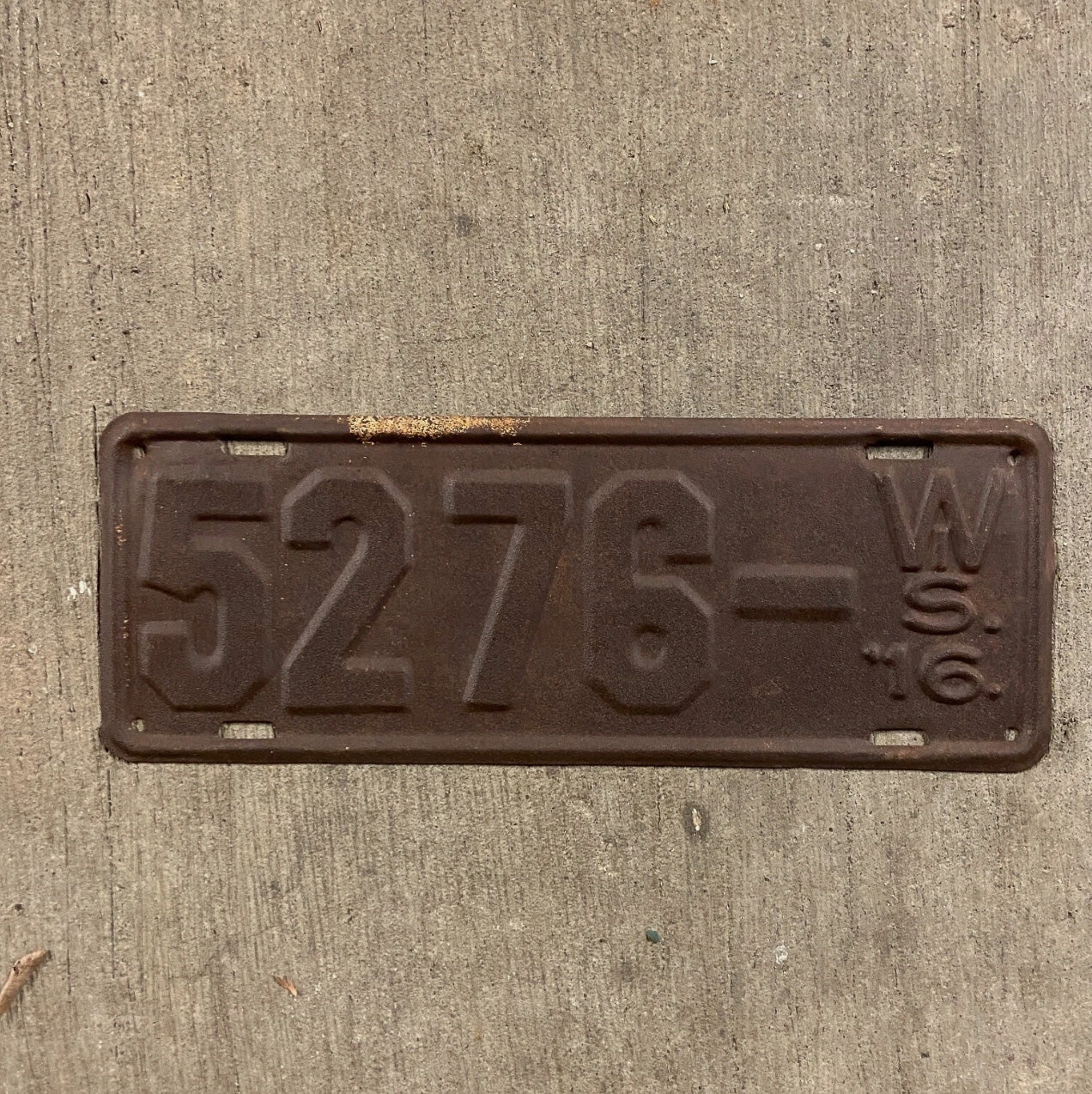 Photo of a 1916 Wisconsin License Plate Auto Tag Garage Decor Vintage Low Number Four Digit 5276 with original patina