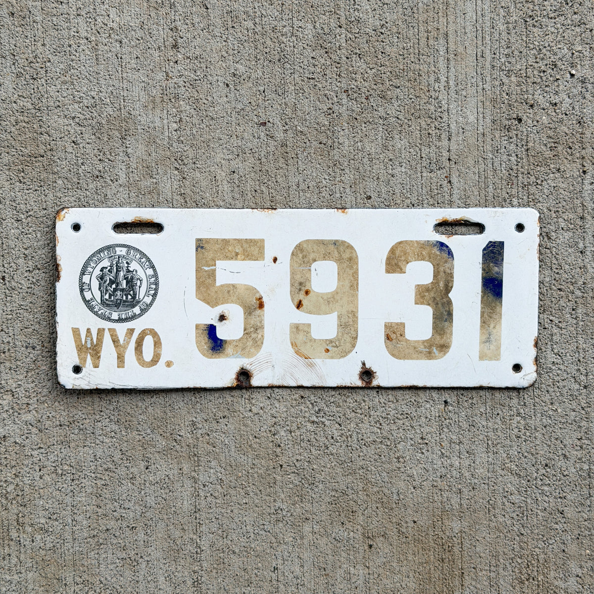 Photo of a 1916 Wyoming Porcelain License Plate Auto Tag Garage Decor Vintage Low Number Four DIgit 5931 with original patina