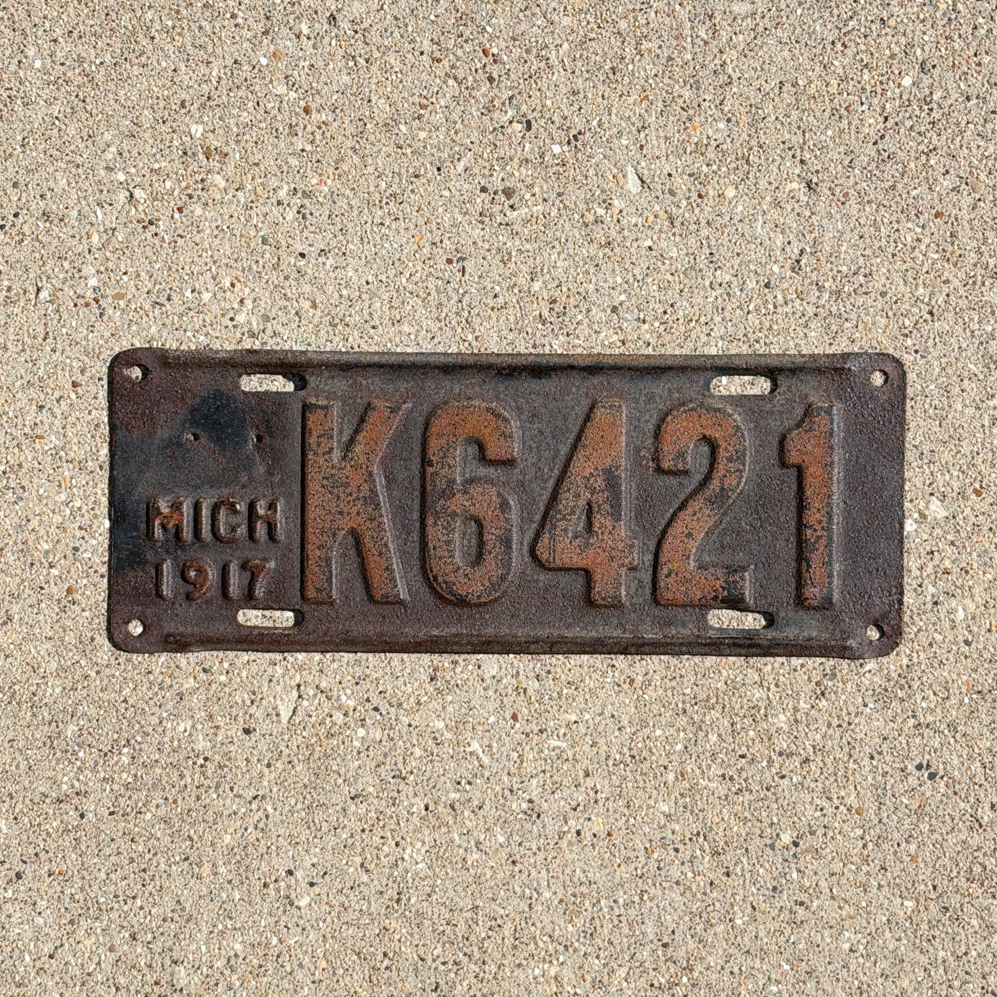 Photo of a 1917 Michigan License Plate Auto Tag Garage Decor Vintage K 6421 with original patina