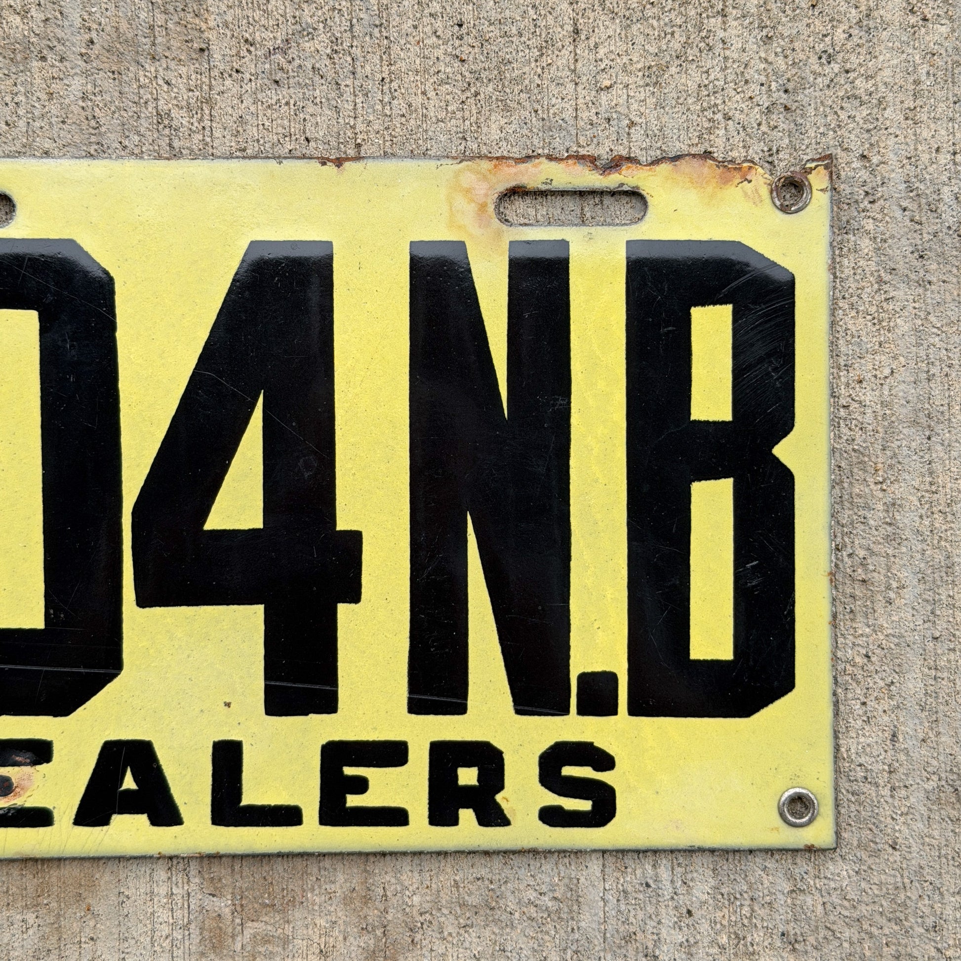 Photo of a 1917 New Brunswick Porcelain Dealer License Plate Auto Tag Garage Decor Vintage High Quality 204 with original patina