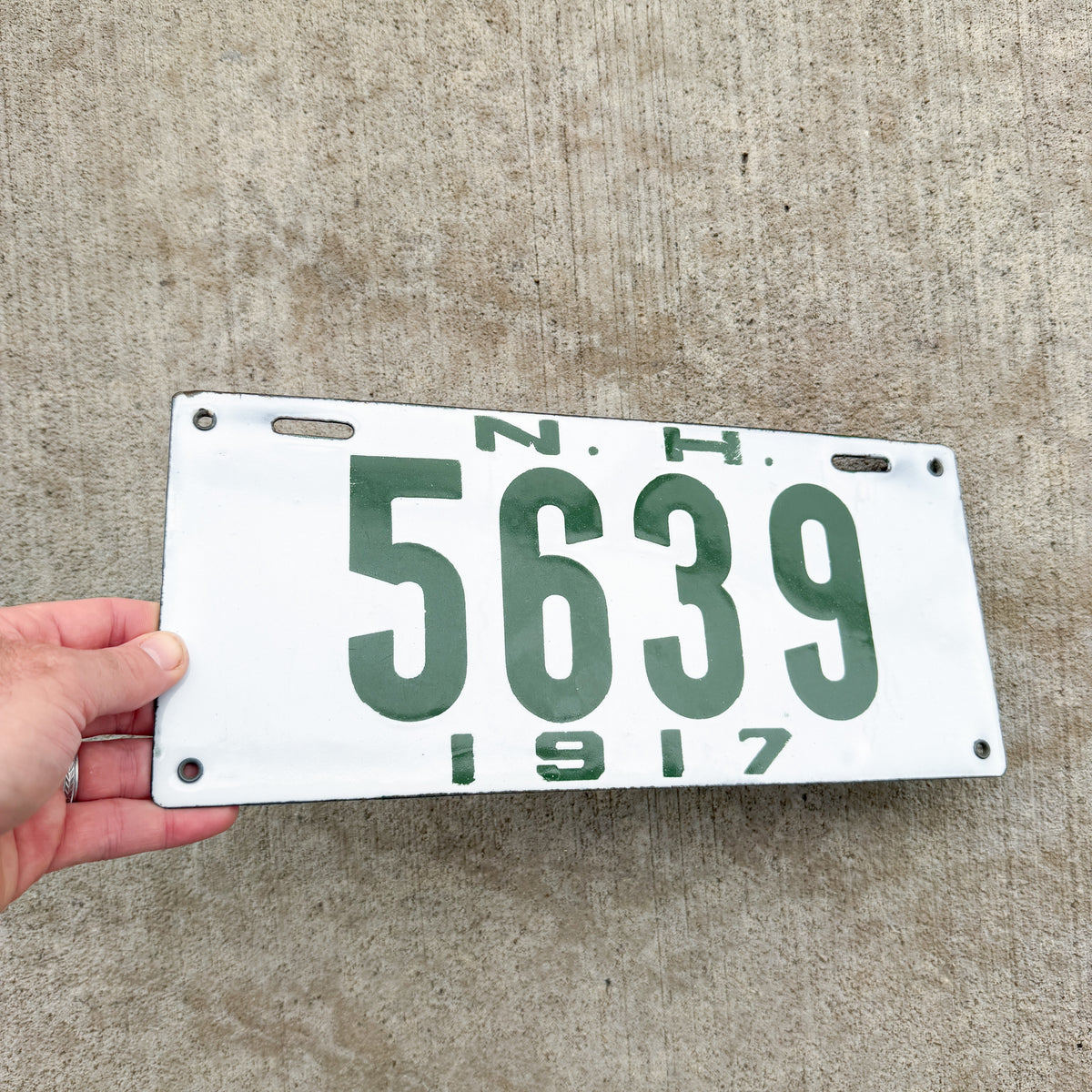 Photo of a 1917 New Hampshire Porcelain License Plate Auto Tag Garage Decor Vintage High Quality 5639 with original patina
