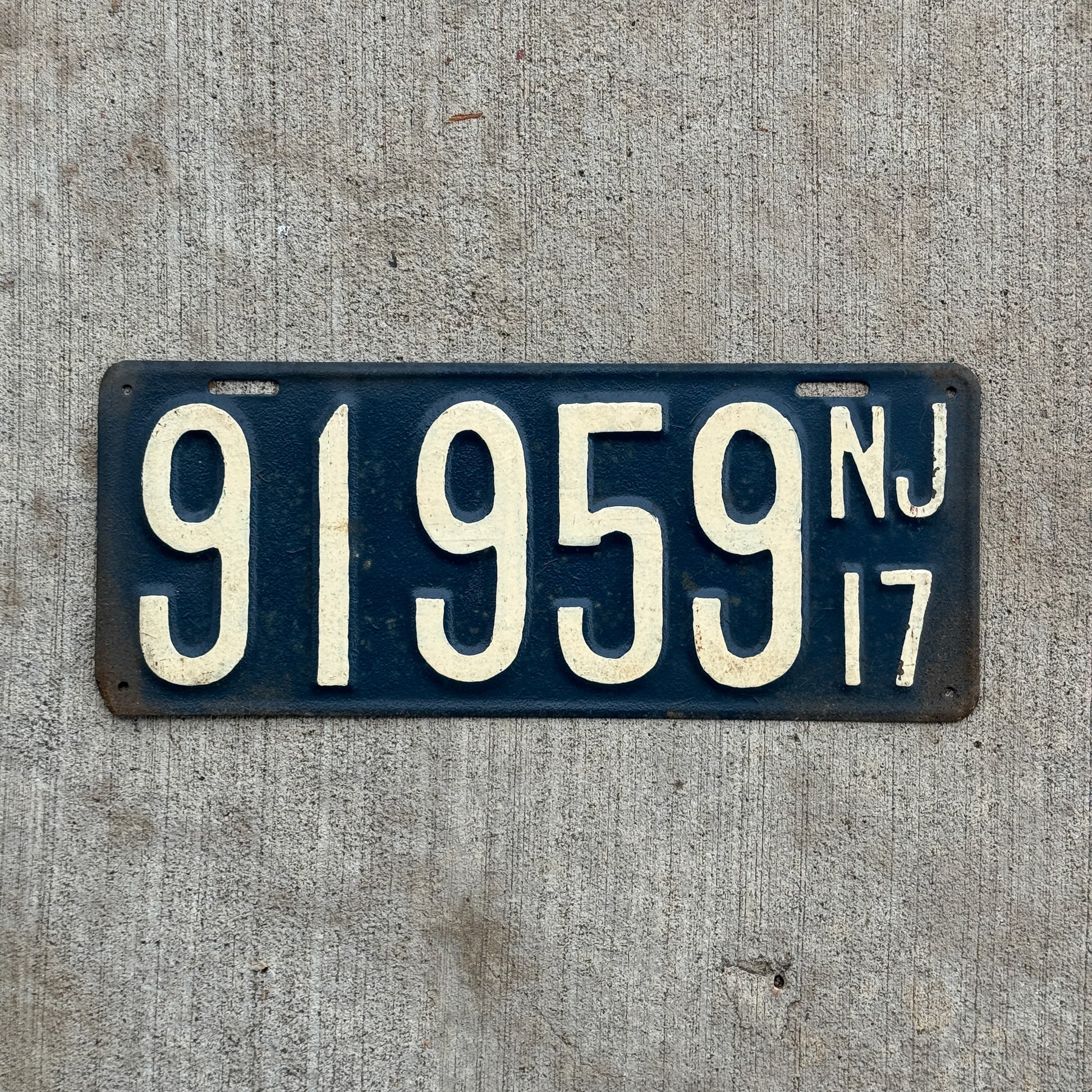 Photo of a 1917 New Jersey License Plate Auto Tag Garage Decor Vintage 91959 with original patina