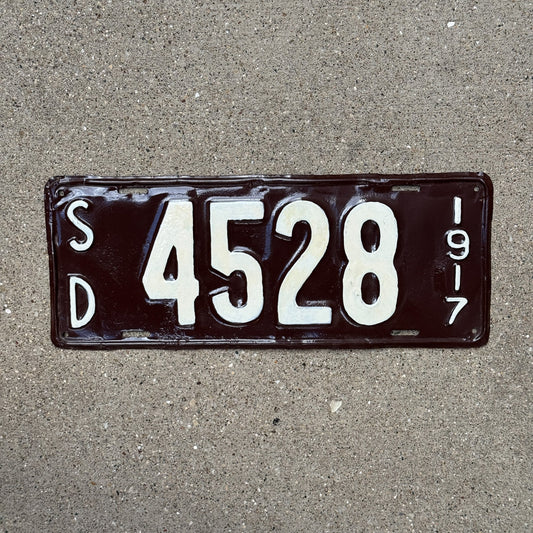 Photo of a 1917 South Dakota License Plate Auto Tag Garage Decor Vintage Four Digit 4528