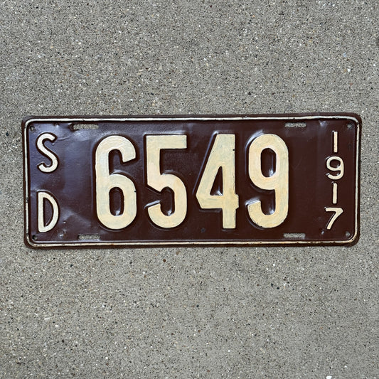 Photo of a 1917 South Dakota License Plate Auto Tag Garage Decor Vintage Four Digit 6549