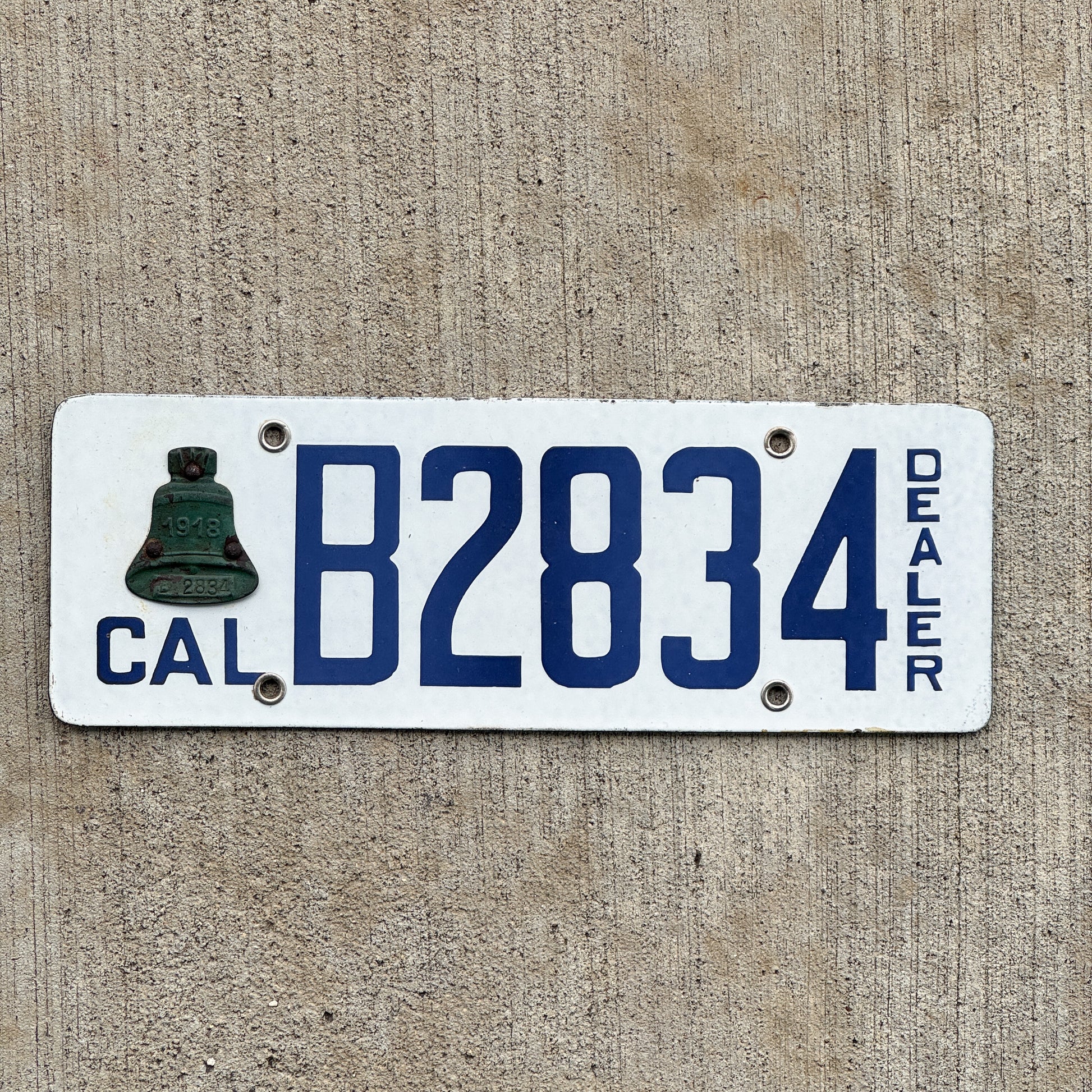 Photo of a 1918 California Porcelain Dealer License Plate Auto Tag Garage Decor Vintage High Quality B 2834 with original patina