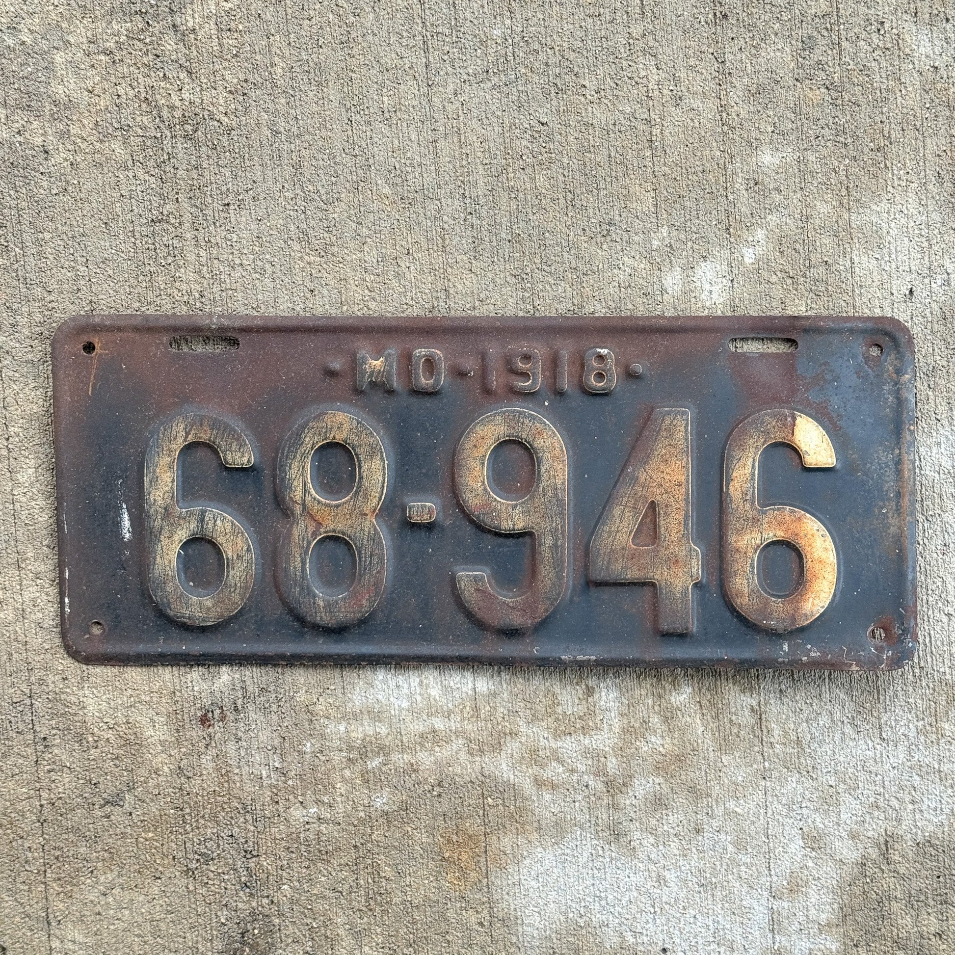 Photo of a 1918 Maryland License Plate Auto Tag Garage Decor Vintage 68 946 with original patina