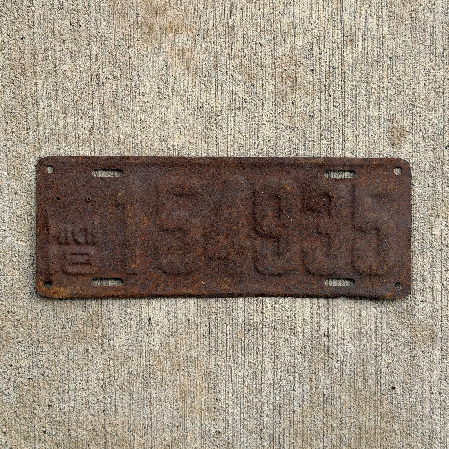 Photo of a 1918 Michigan License Plate Auto Tag Garage Decor Vintage 154935 with original patina