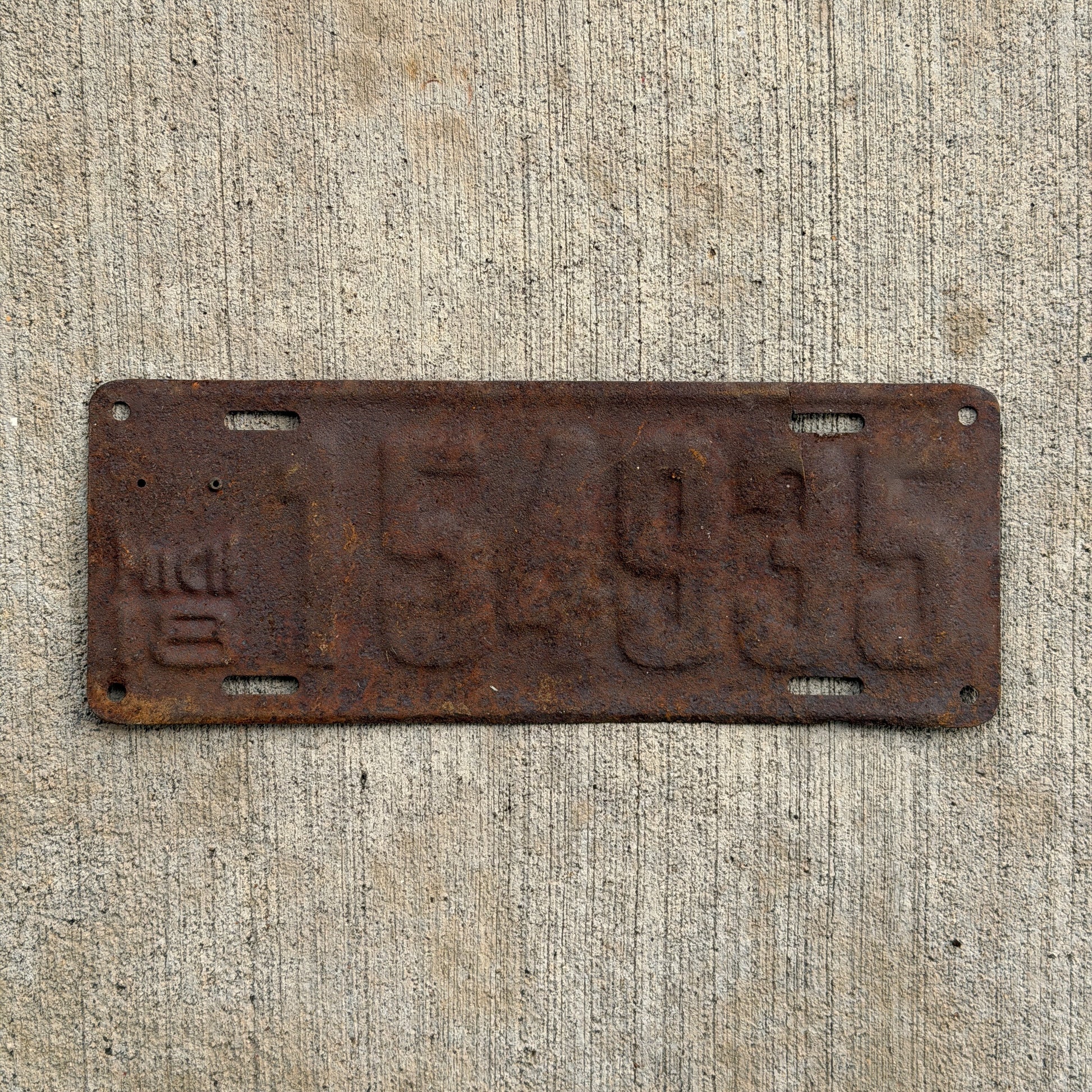 Photo of a 1918 Michigan License Plate Auto Tag Garage Decor Vintage 154935 with original patina