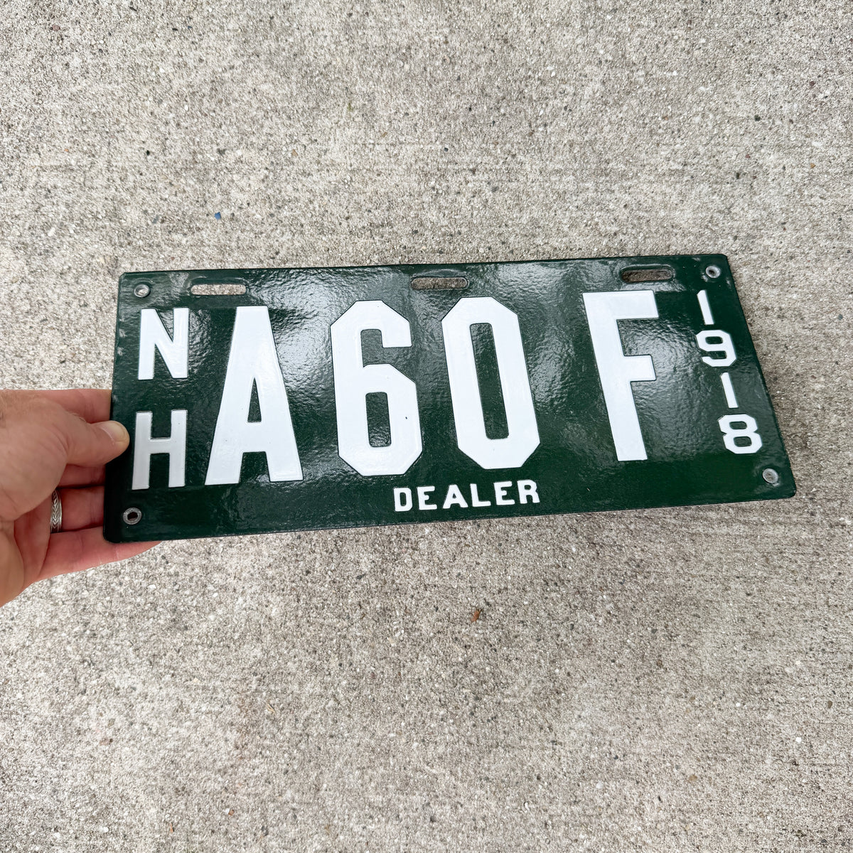 Photo of a 1918 New Hampshire Porcelain Dealer License Plate Auto Tag Garage Decor Vintage High Quality A 60 F with original patina