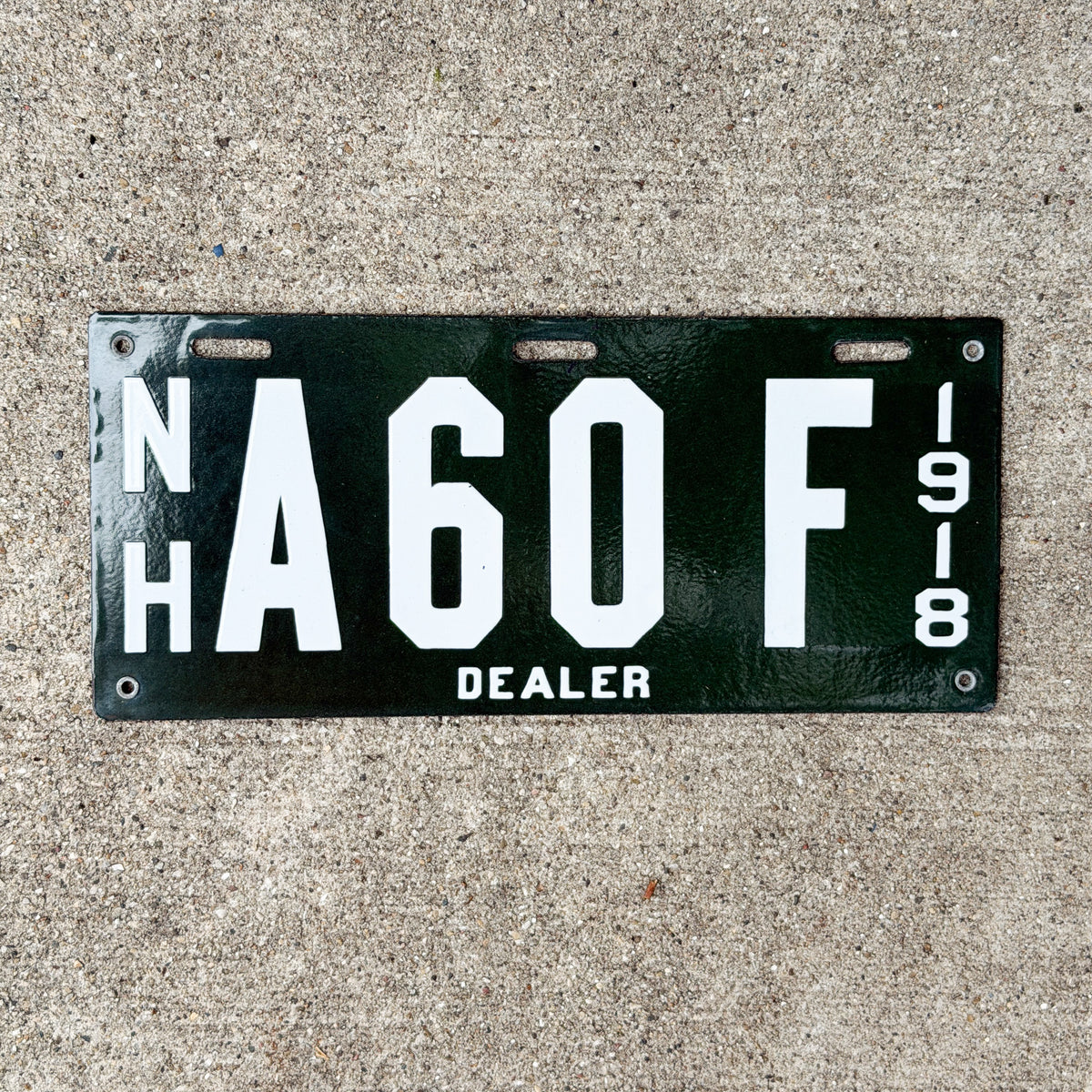 Photo of a 1918 New Hampshire Porcelain Dealer License Plate Auto Tag Garage Decor Vintage High Quality A 60 F with original patina