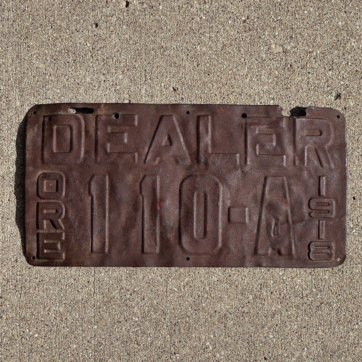 Photo of a 1918 Oregon Dealer License Plate Auto Tag Garage Decor Vintage 110 A with original patina