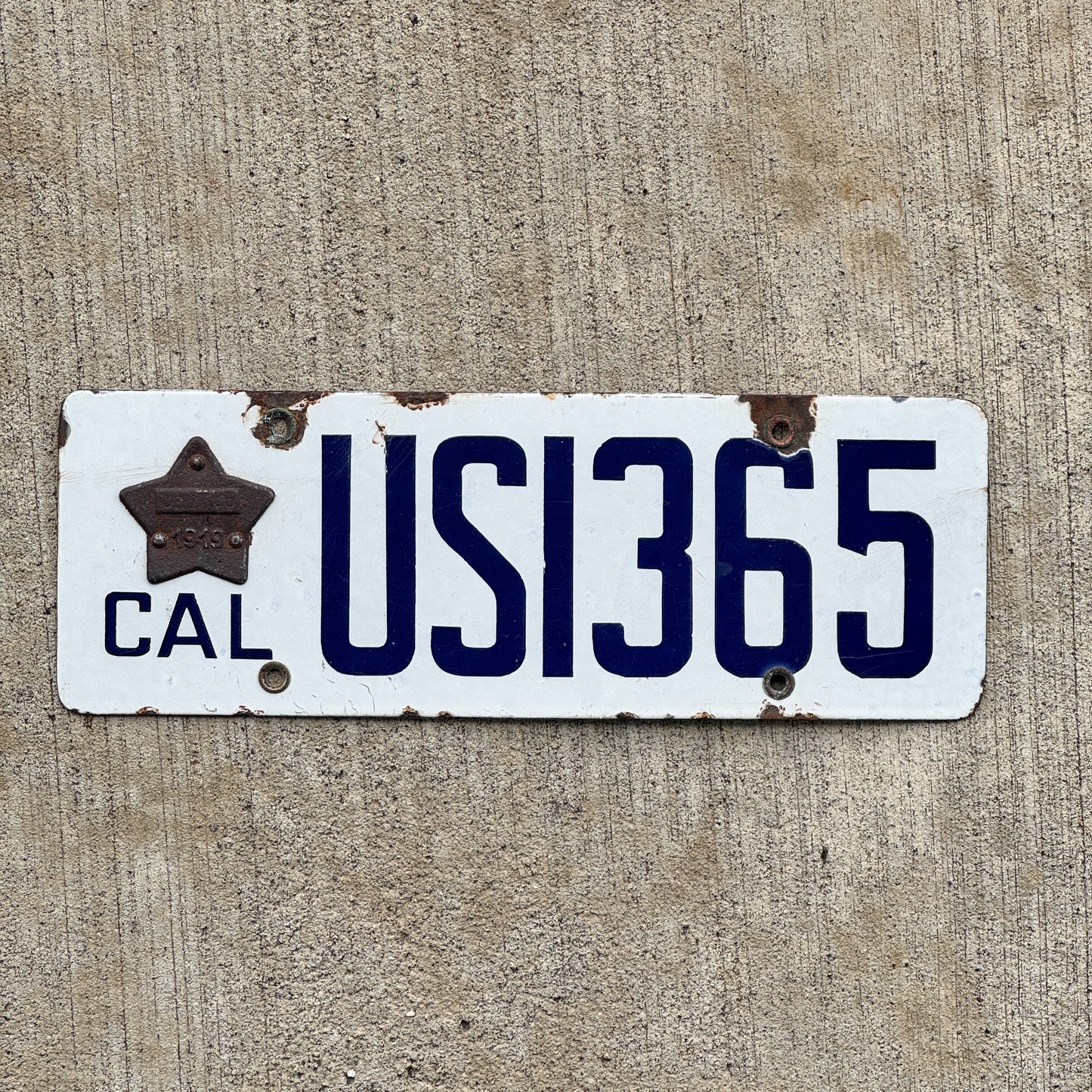 Photo of a 1919 California Porcelain US Government License Plate Auto Tag Garage Decor Vintage High Quality US 1365 with original patina