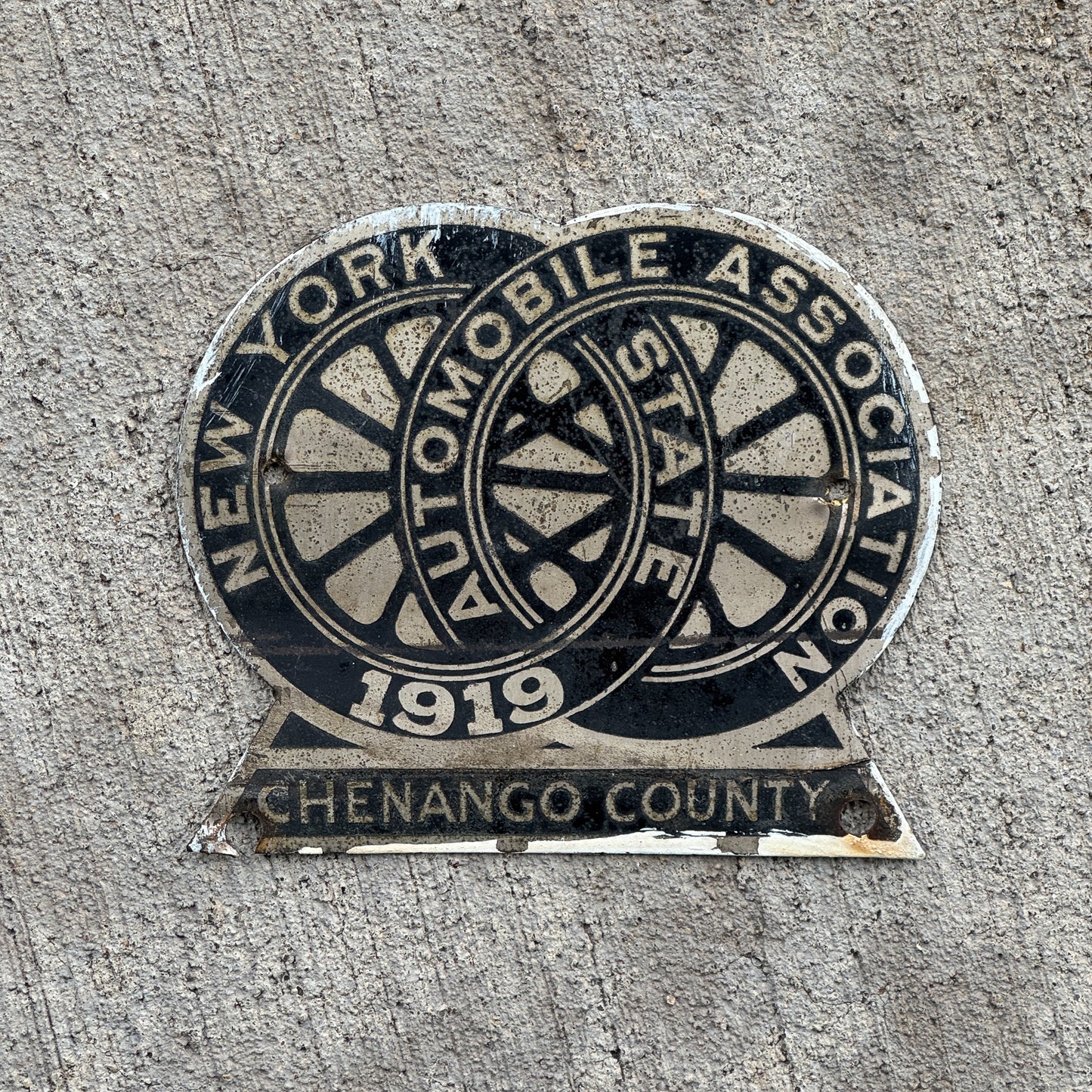 Photo of a 1919 Chenango County New York Badge Emblem License Plate Topper Auto Tag Garage Decor Vintage with original patina