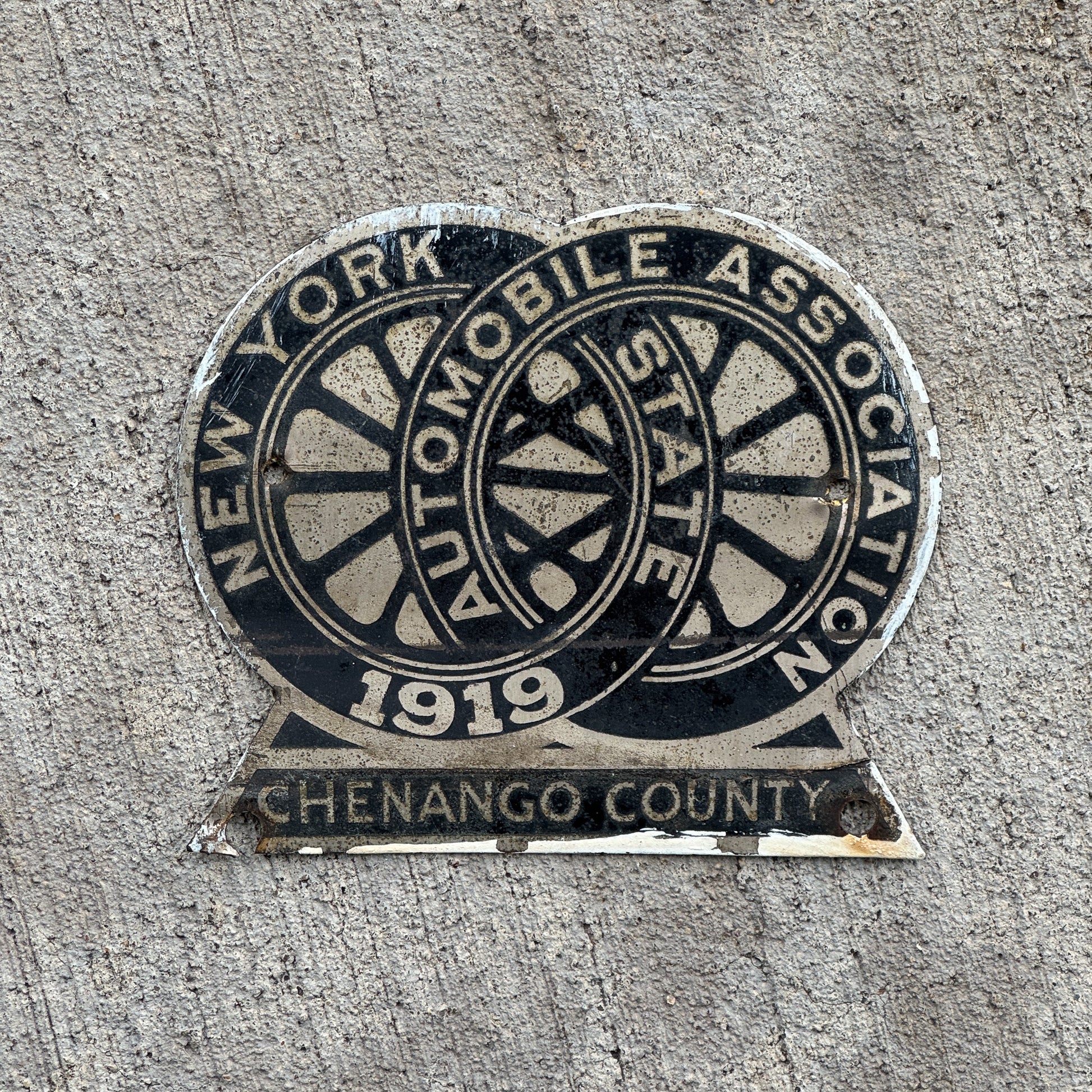 Photo of a 1919 Chenango County New York Badge Emblem License Plate Topper Auto Tag Garage Decor Vintage with original patina