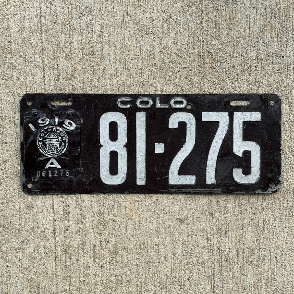 Photo of a 1919 Colorado License Plate Auto Tag Garage Decor Vintage 81 275 with original patina