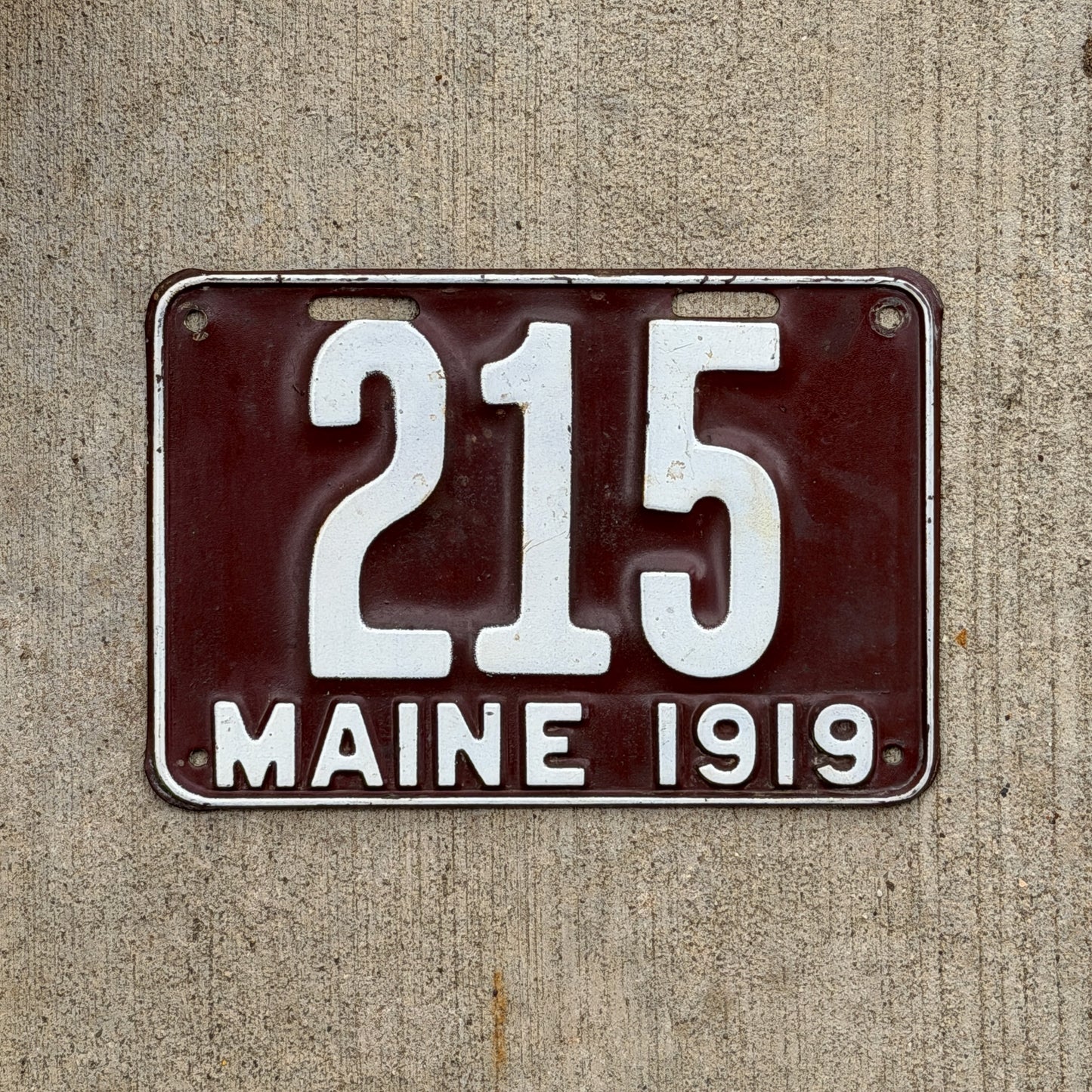 Photo of a 1919 Maine License Plate Auto Tag Garage Decor Vintage Low Number Three Digit 215 with original patina